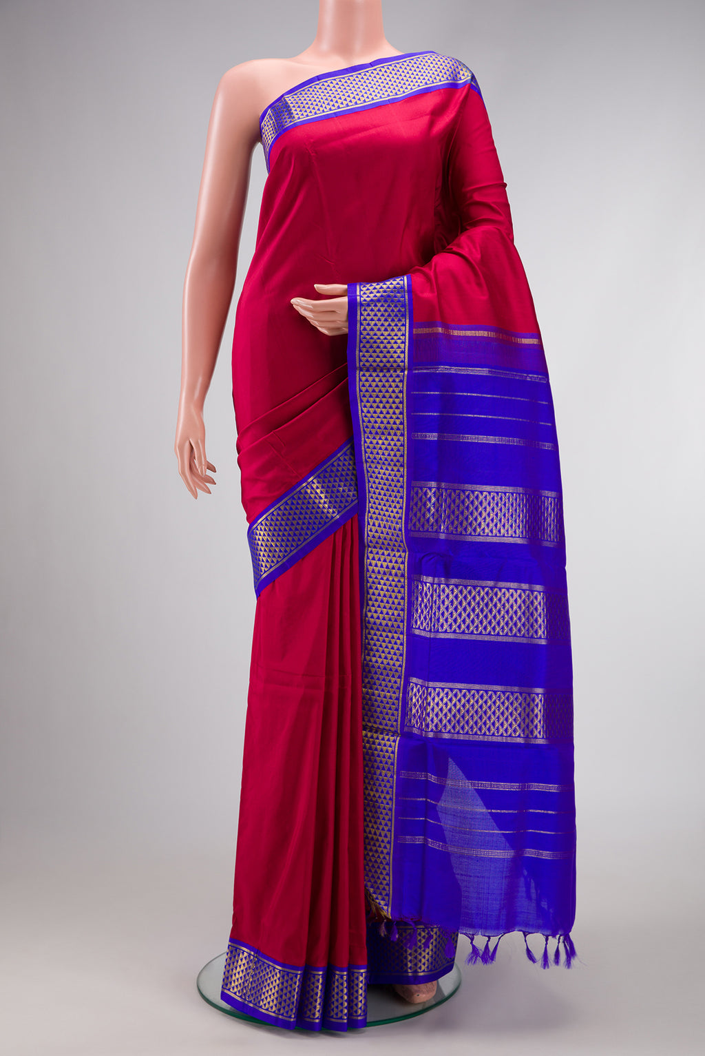 Pure Silk Pure Zari Maroon Dual Tone Kanjivaram Nine Yards Saree with Plain Body and Zari Border.  displayed on a mannequin