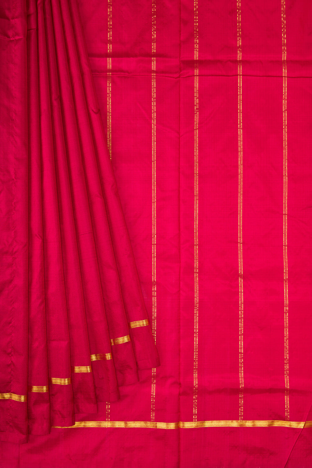 Pleats and pallu of Maroon Kanchipuram Silk Nine Yards Saree with Plain Body and Zari Border. 