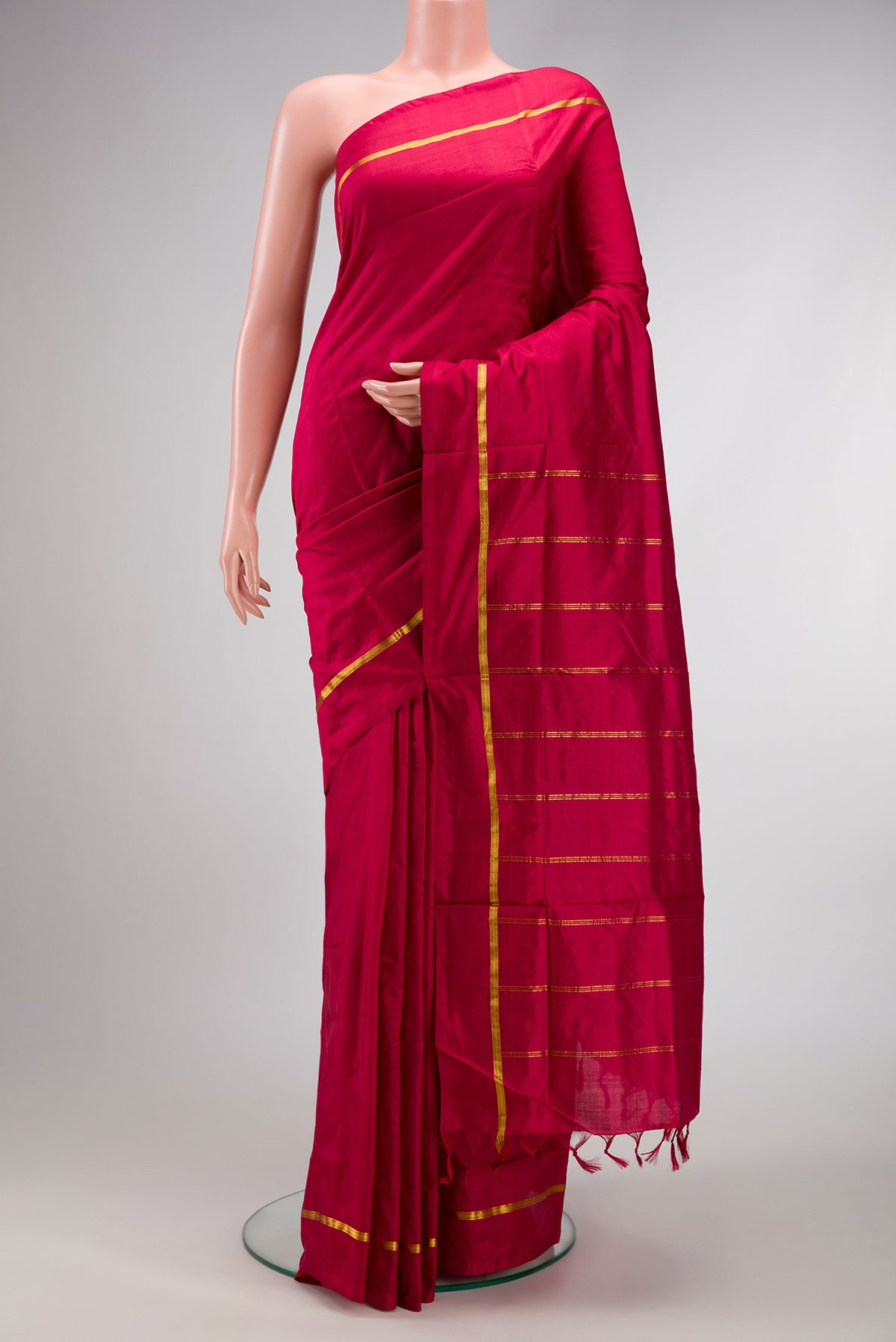 Maroon Dual Tone Kanchipuram Silk Nine Yards Saree with Plain Body and Zari Border.  displayed on a mannequin