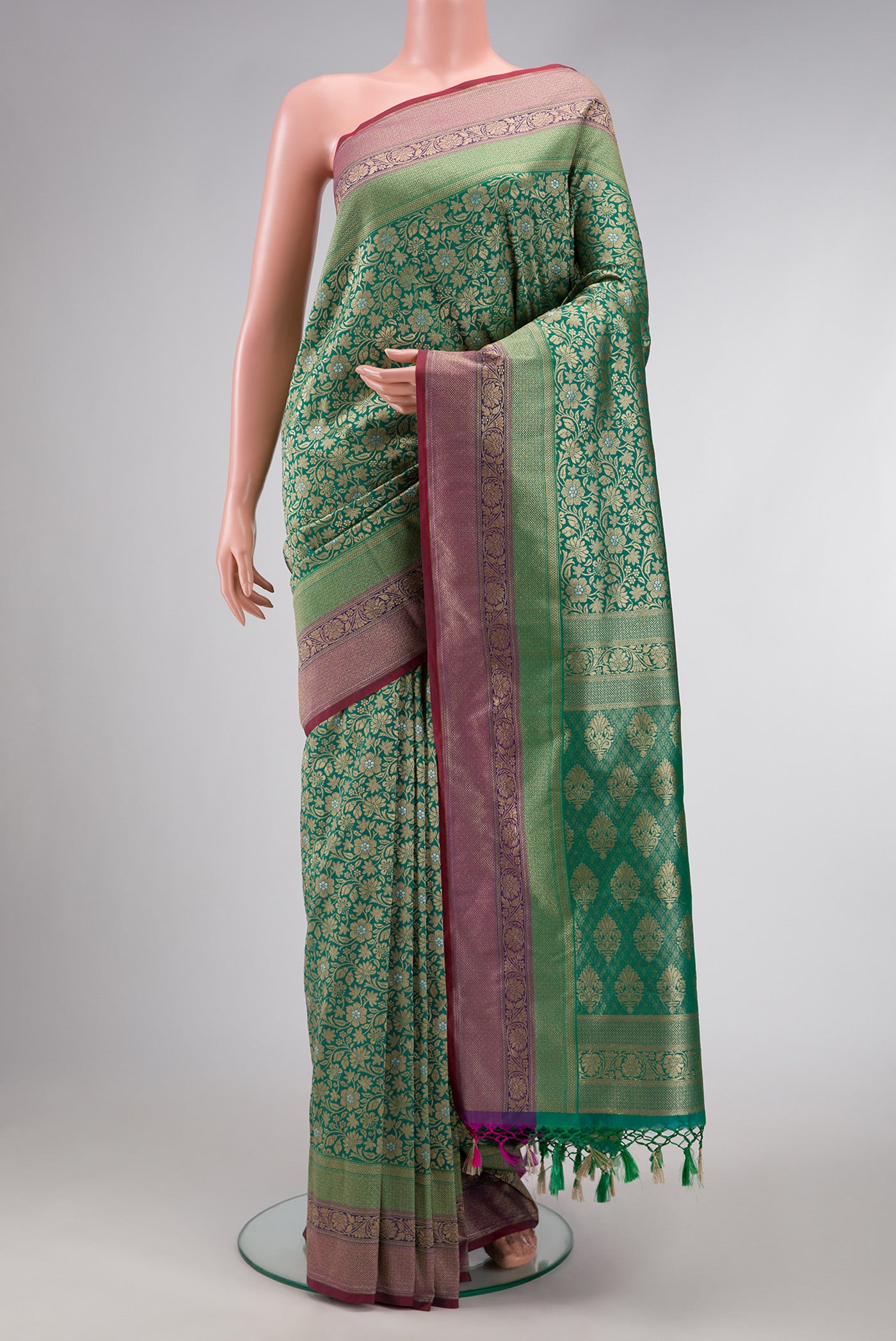 Green Dual Tone Blended Banarasi Silk Saree with Zari Brocade on the body and Zari Border.  displayed on a mannequin