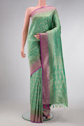 Sea Green Dual Tone Blended Banarasi Silk Saree with Zari Brocade on the body and Zari Border.  displayed on a mannequin