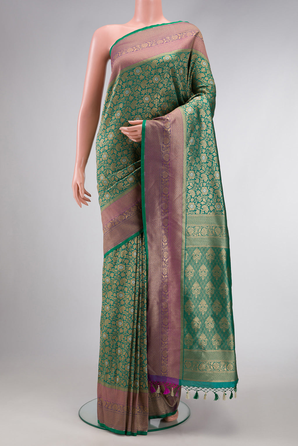 Sea Green Dual Tone Blended Banarasi Silk Saree with Zari Brocade on the body and Zari Border.  displayed on a mannequin