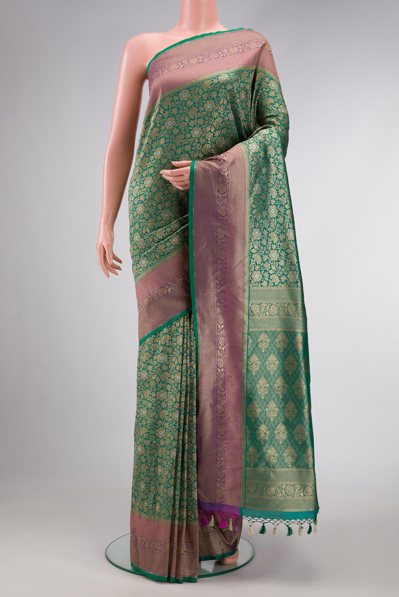 Sea Green Dual Tone Blended Banarasi Silk Saree with Zari Brocade on the body and Zari Border.  displayed on a mannequin