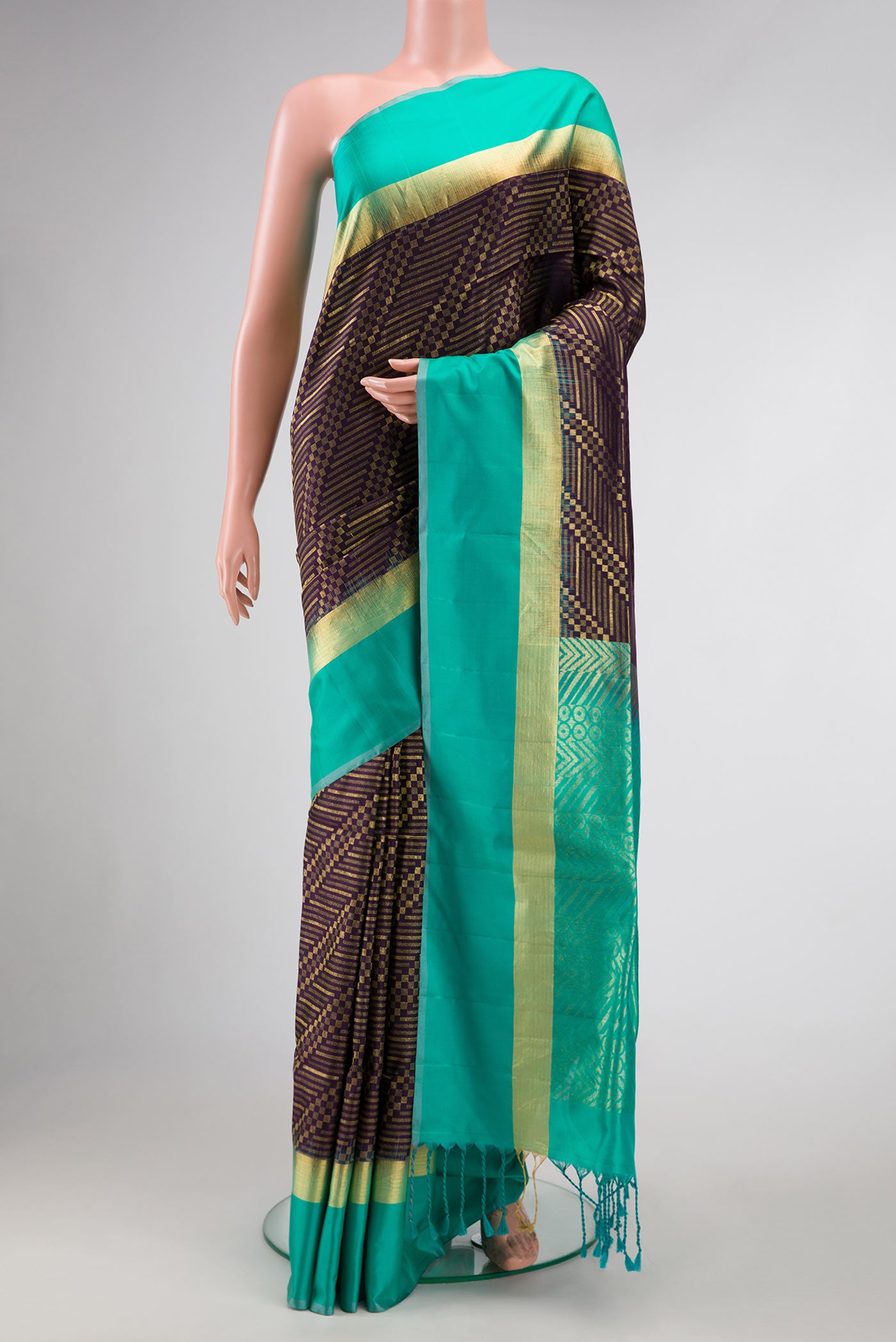 Burgundy Dual Tone Soft Silk Saree with Zari Brocade on the body and Zari Border.  displayed on a mannequin