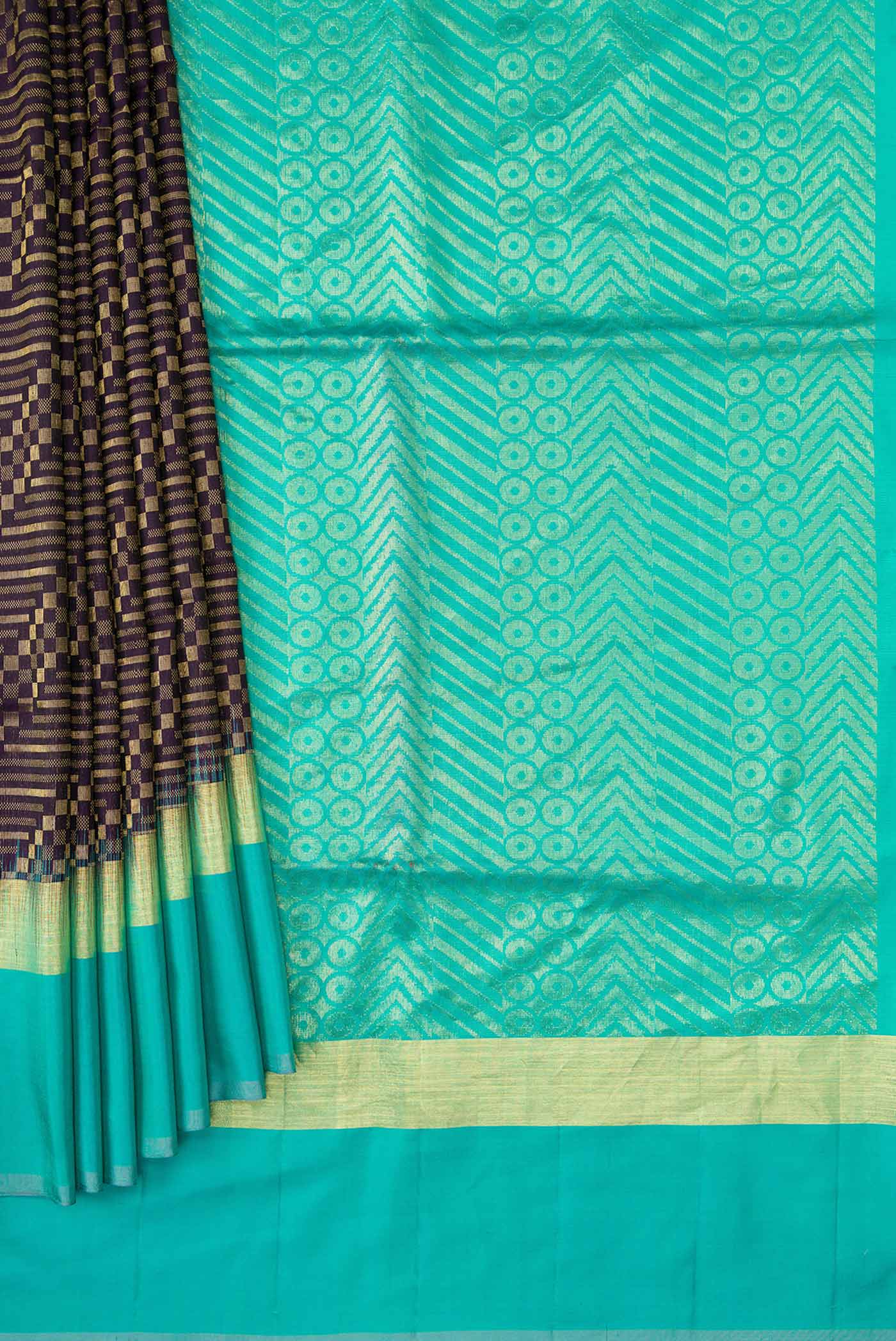 Pleats and pallu of Burgundy Dual Tone Soft Silk Saree with Zari Brocade on the body and Zari Border. 