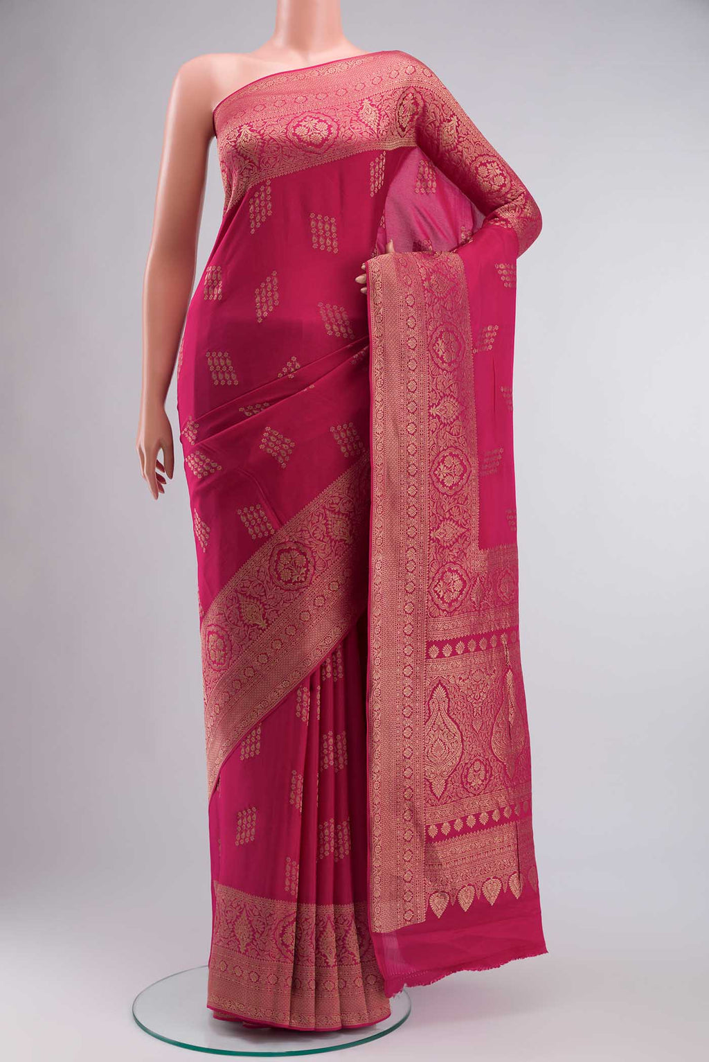 Pink Mysore Crepe Saree with Zari Butta on the body and Zari Border displayed on a mannequin