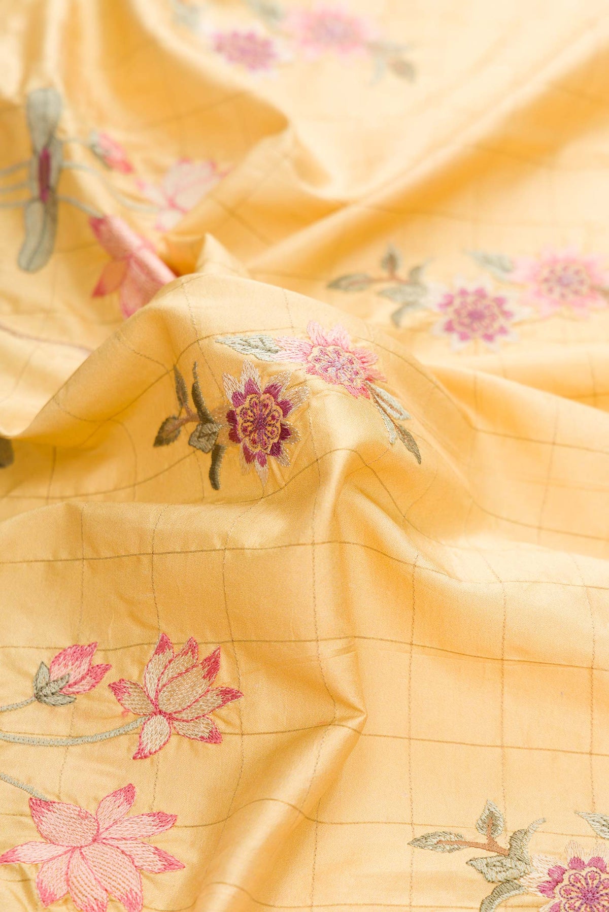 Close up of Sandal Dual Tone Kanchipuram Silk Saree with Embroidery on the body and Embroidery Border displaying folds