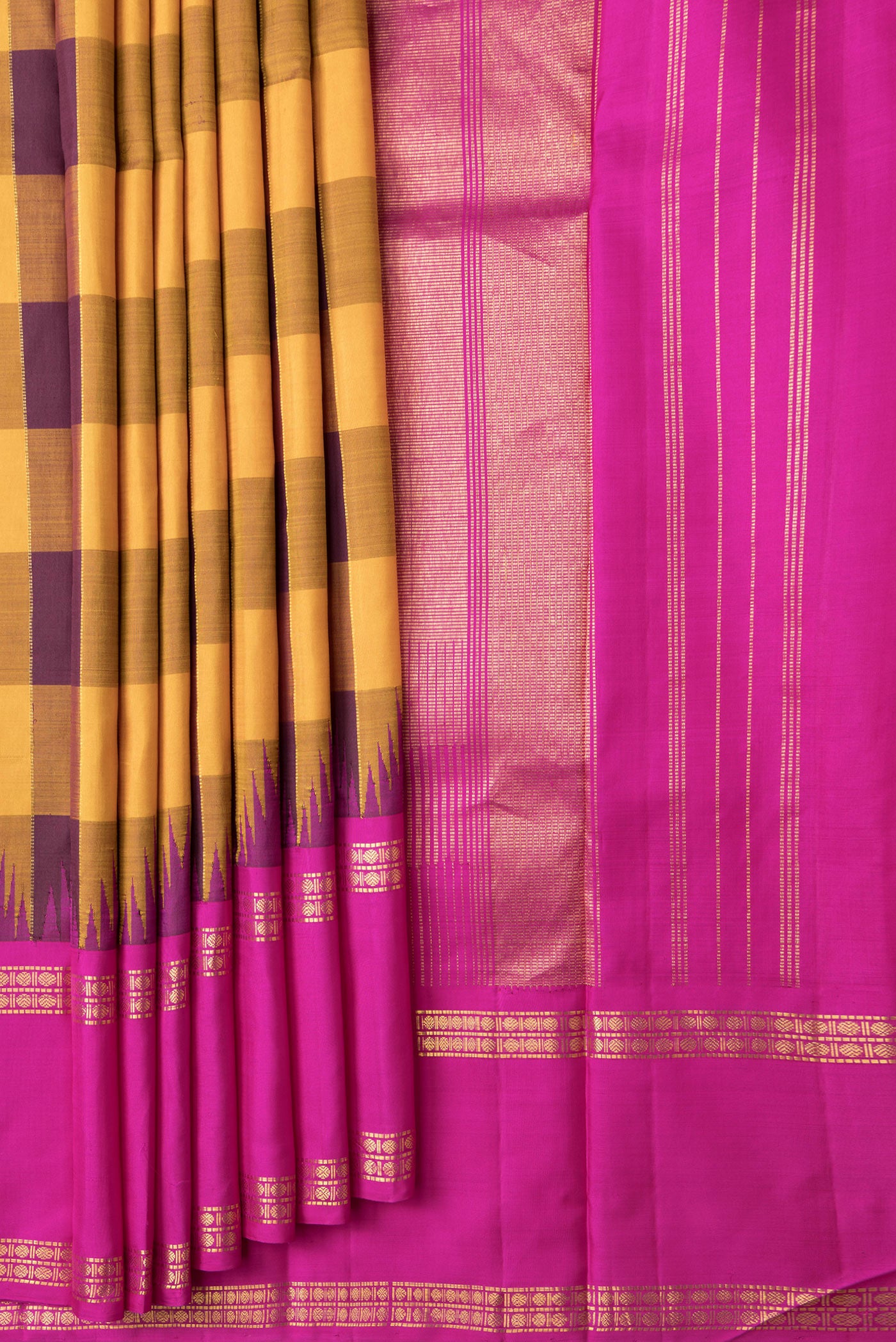 Pleats and pallu of Mustard and Burgundy Color Kanjivaram Silk Saree with Checked design on the body and Zari Border. 