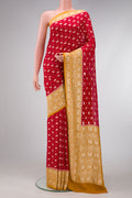 Maroon Dual Tone Banarasi Georgette Saree with Zari Butta on the body and Zari Border.  displayed on a mannequin