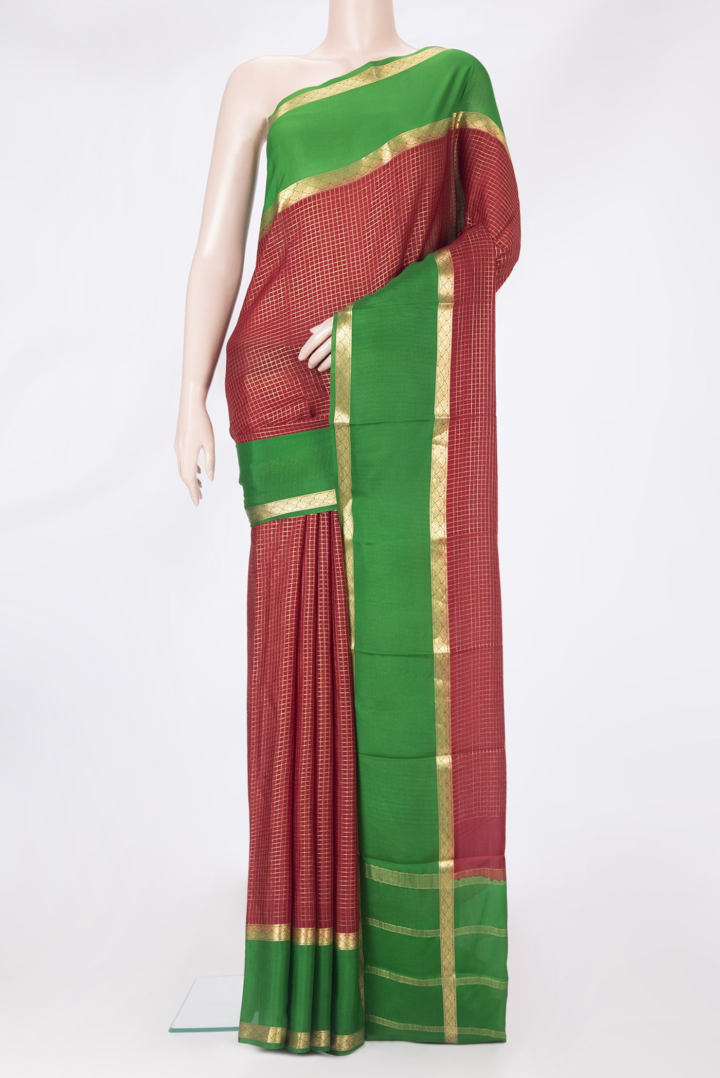 Maroon Mysore Silk Saree with Checked design on the body and Zari Border.  displayed on a mannequin