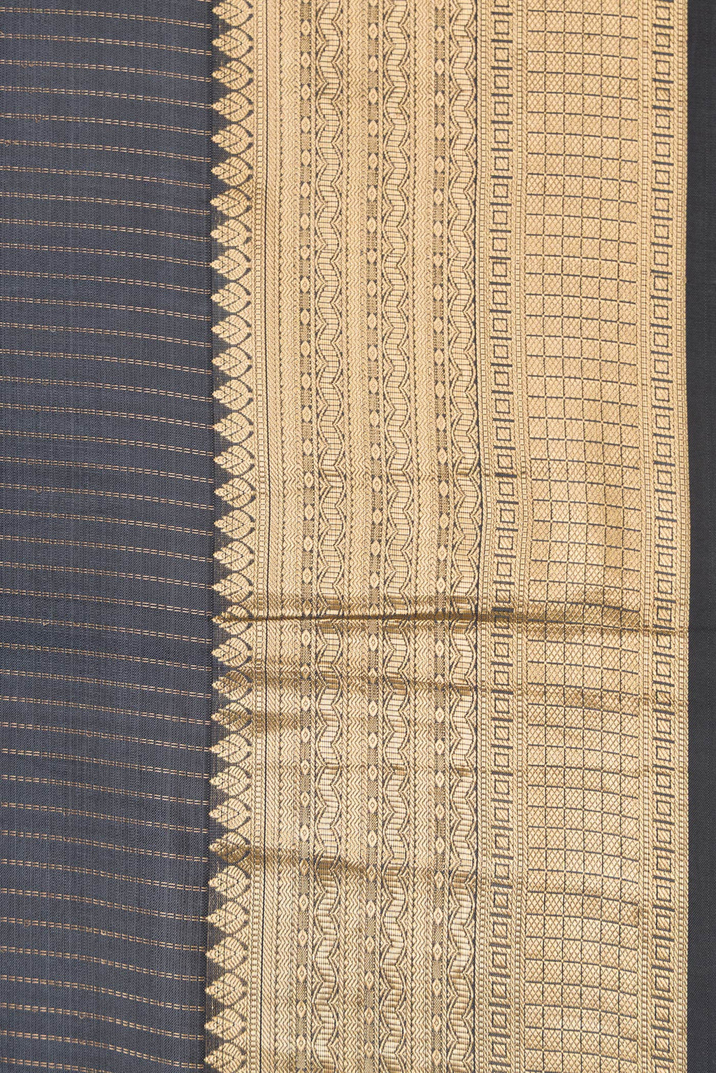 Border image of Grey Dual Tone Kanchipuram Silk Saree with Stripes on the body and Zari Border. 
