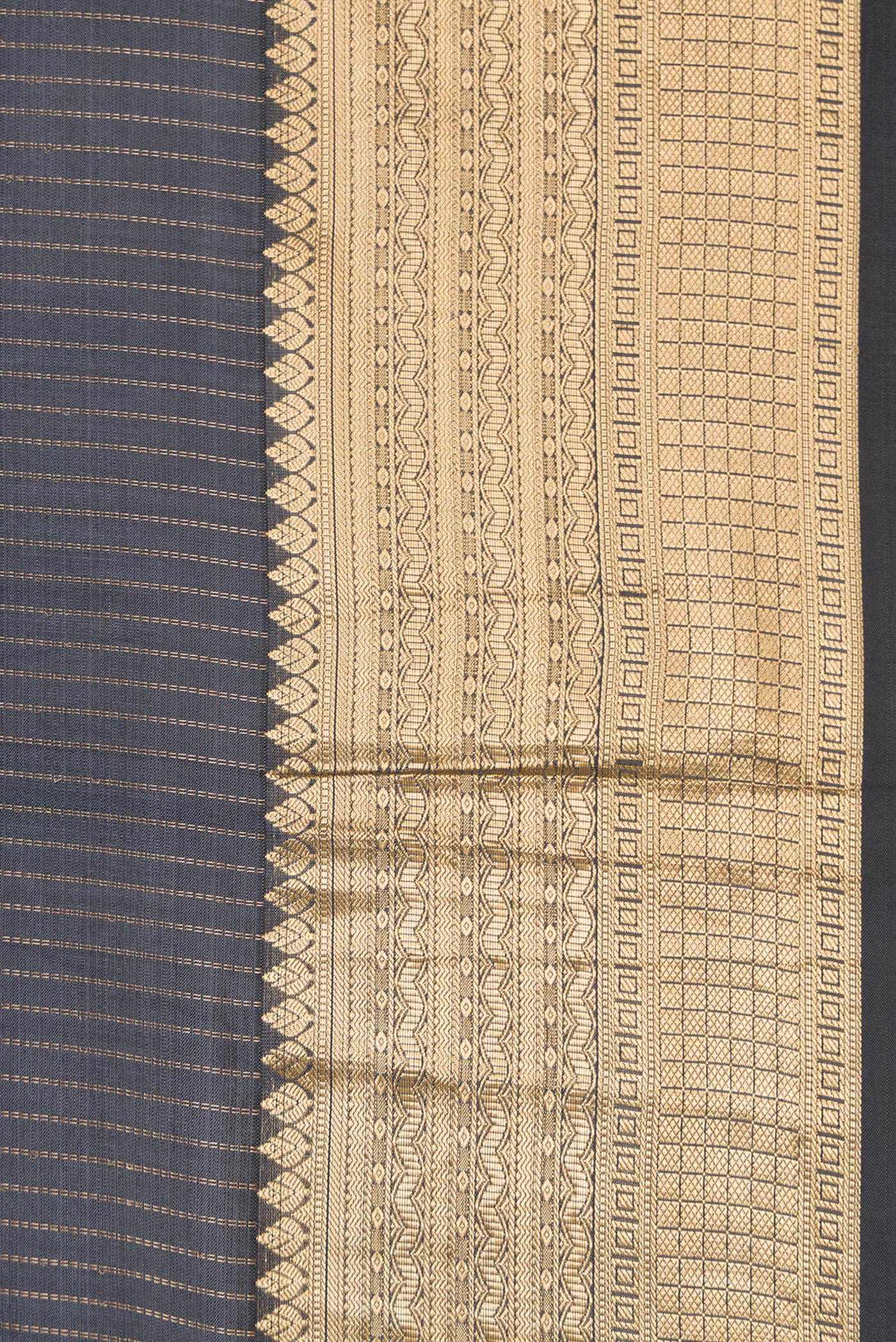 Border image of Grey Dual Tone Kanchipuram Silk Saree with Stripes on the body and Zari Border. 