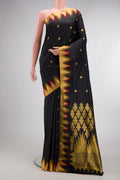 Pure Silk Black Bangalore Saree with Zari Butta on the body and Temple Border.  displayed on a mannequin