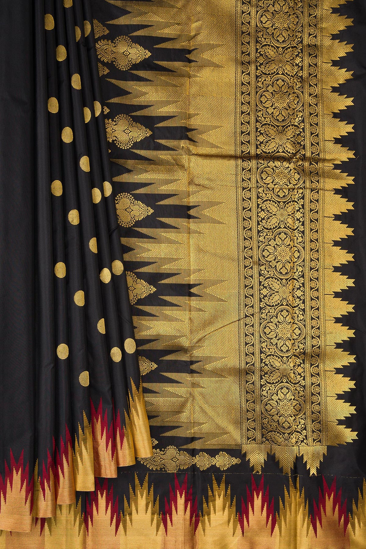 Pleats and pallu of Pure Silk Black Bangalore Saree with Zari Butta on the body and Temple Border. 