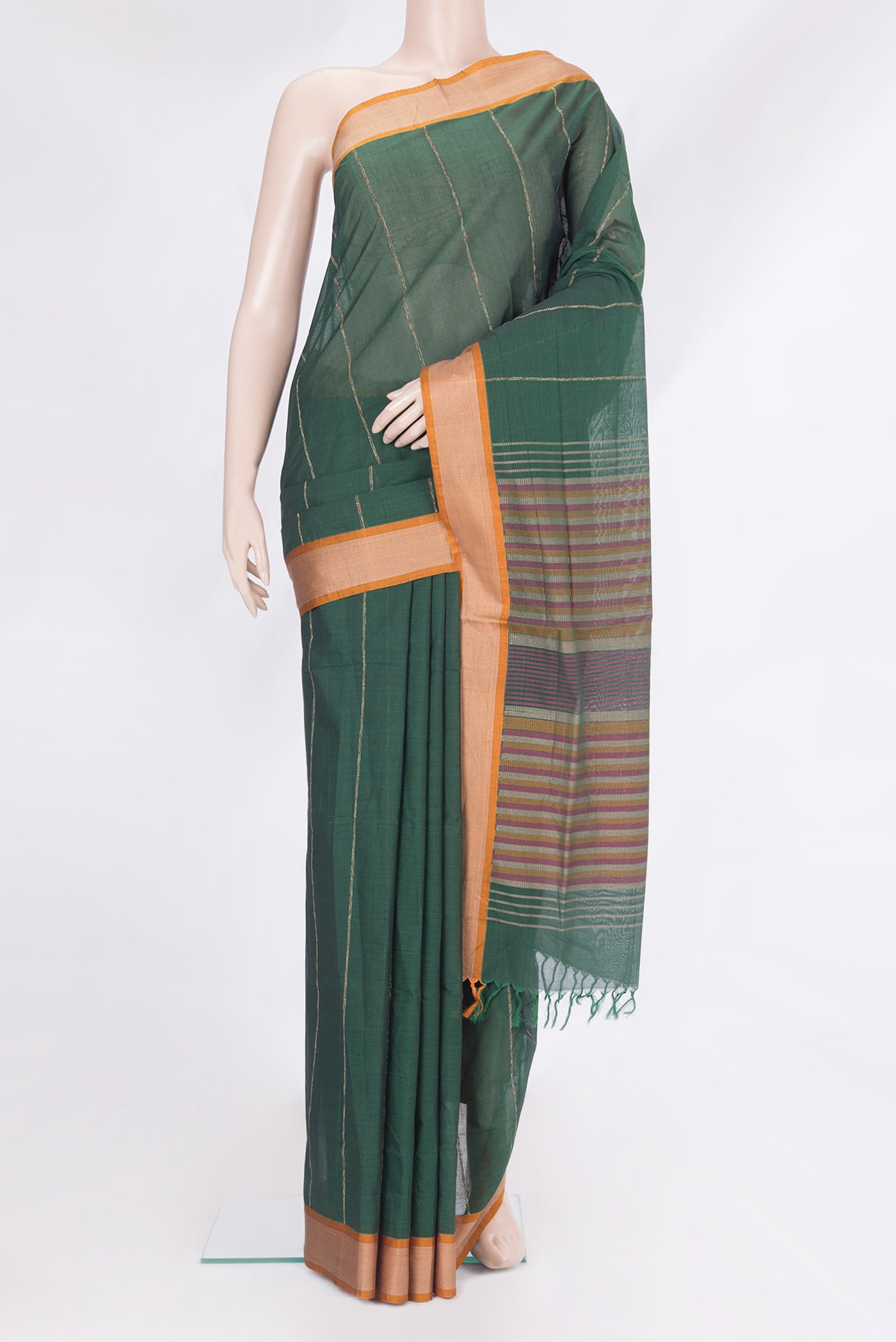 Bottle Green Coimbatore Cotton Saree with Stripes on the body and Thread Border.  displayed on a mannequin
