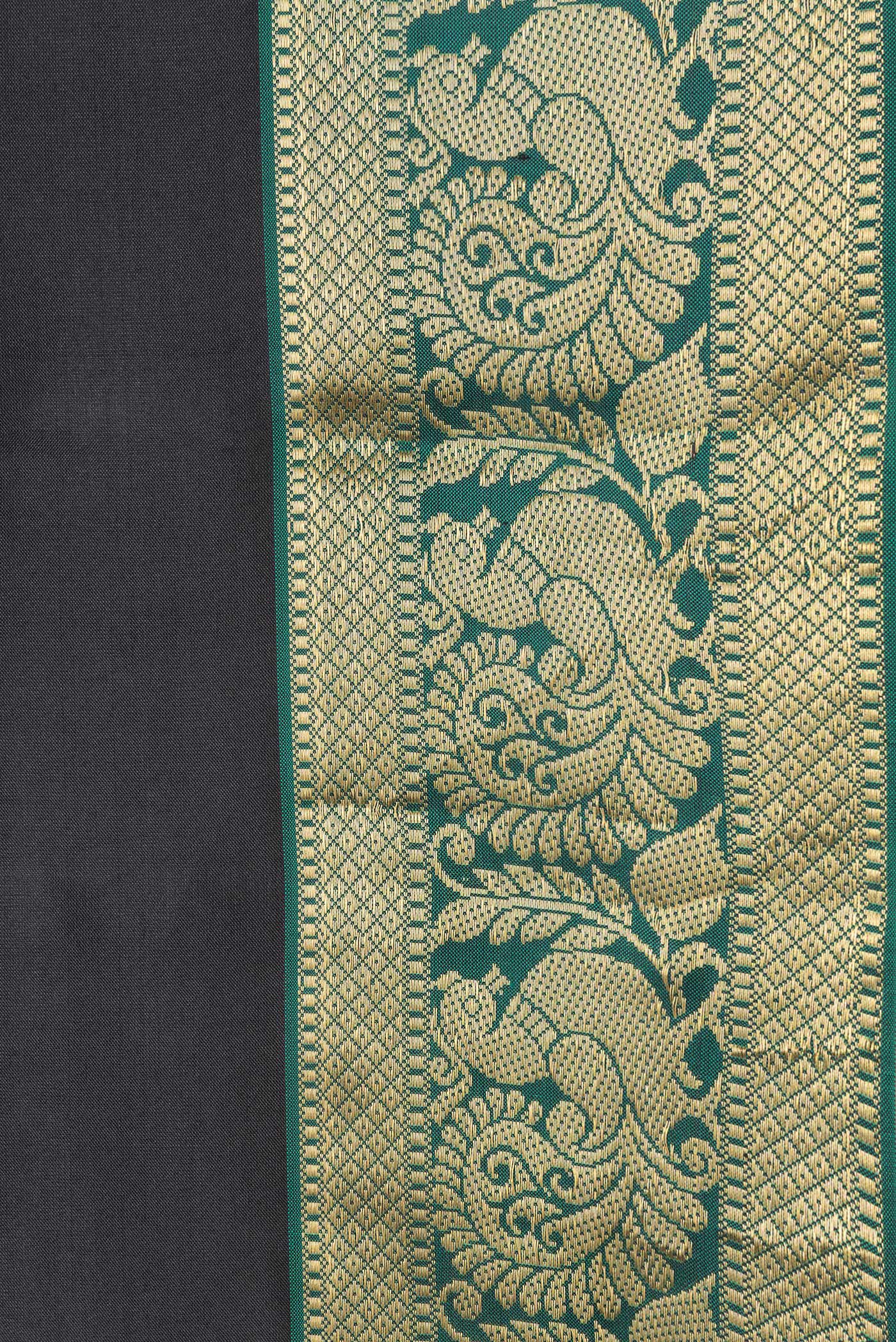 Border image of Black Dual Tone Kanjivaram Silk Saree with Plain Body and Zari Border. 
