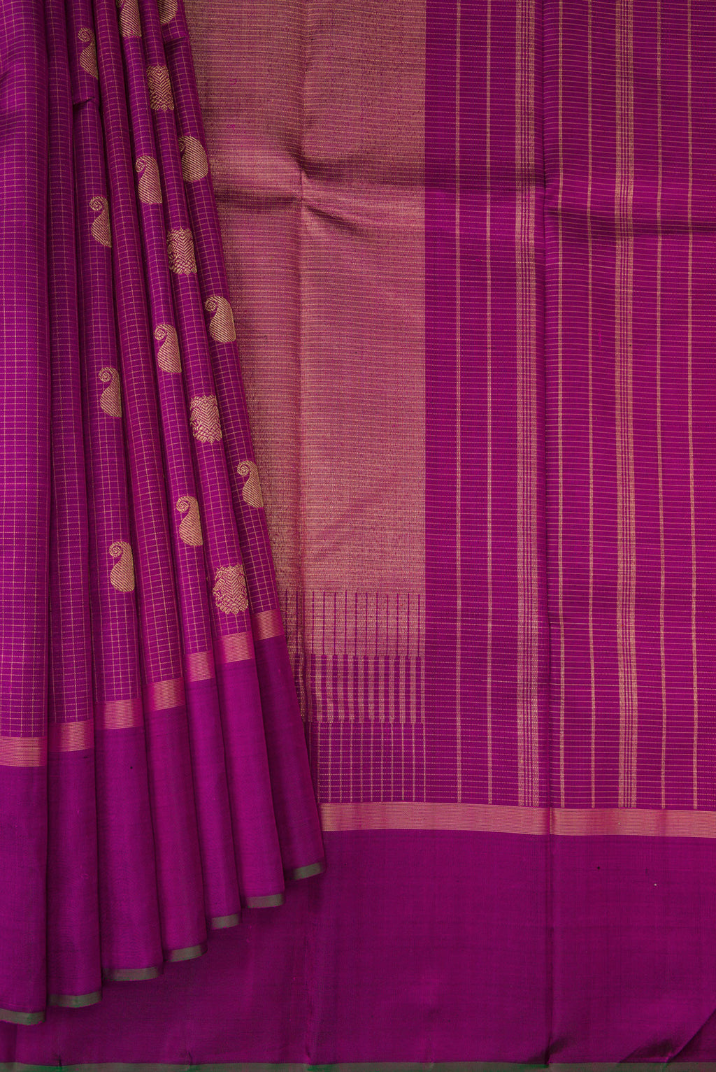 Pleats and pallu of Purple Kanchipuram Silk Saree with Checked design on the body and Zari Border. 
