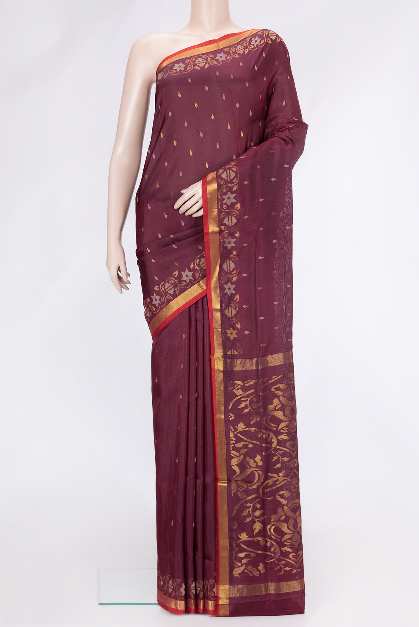 Maroon Dual Tone Uppada Silk Saree with Zari And Thread Butta on the body and Fancy Border.  displayed on a mannequin