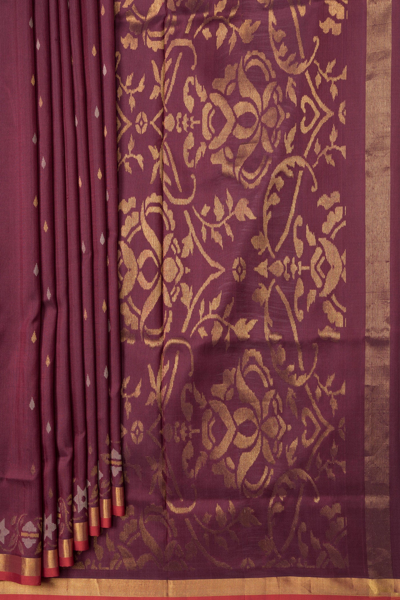 Pleats and pallu of Maroon Dual Tone Uppada Silk Saree with Zari And Thread Butta on the body and Fancy Border. 