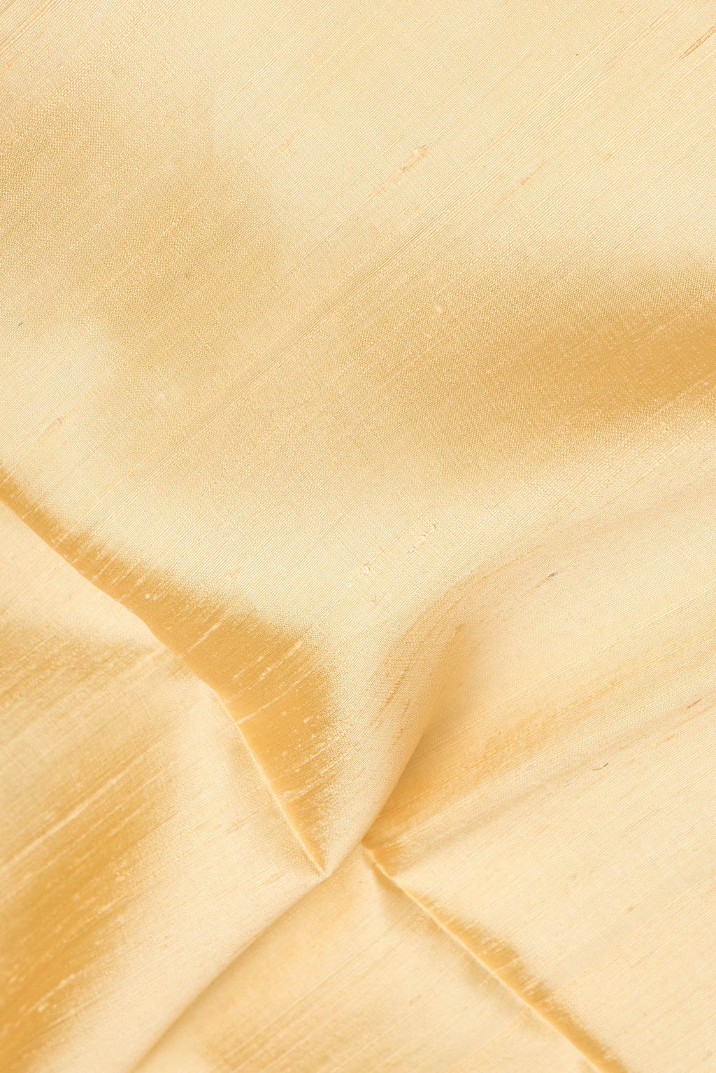 Close up of Sandal Dual Tone Raw Silk Saree with Plain Body and Zari And Thread Border.  displaying folds