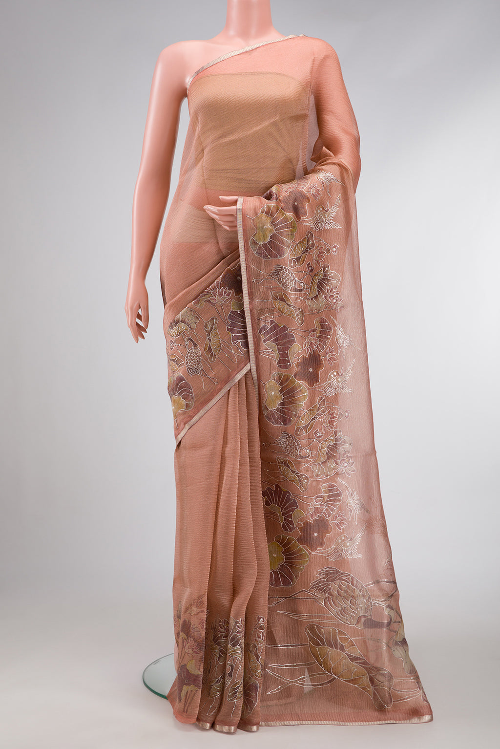 Rose Gold Dual Tone Organza Silk Saree with Plain Body and Embroidery Border.  displayed on a mannequin