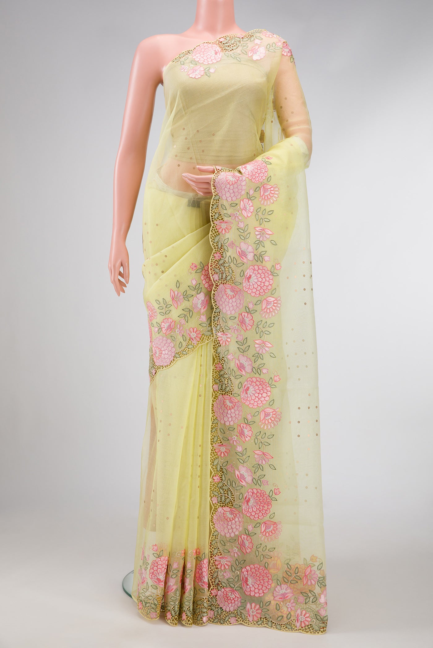 Lemon Yellow Dual Tone Organza Silk Saree with Embroidery on the body and Embroidery Border.  displayed on a mannequin