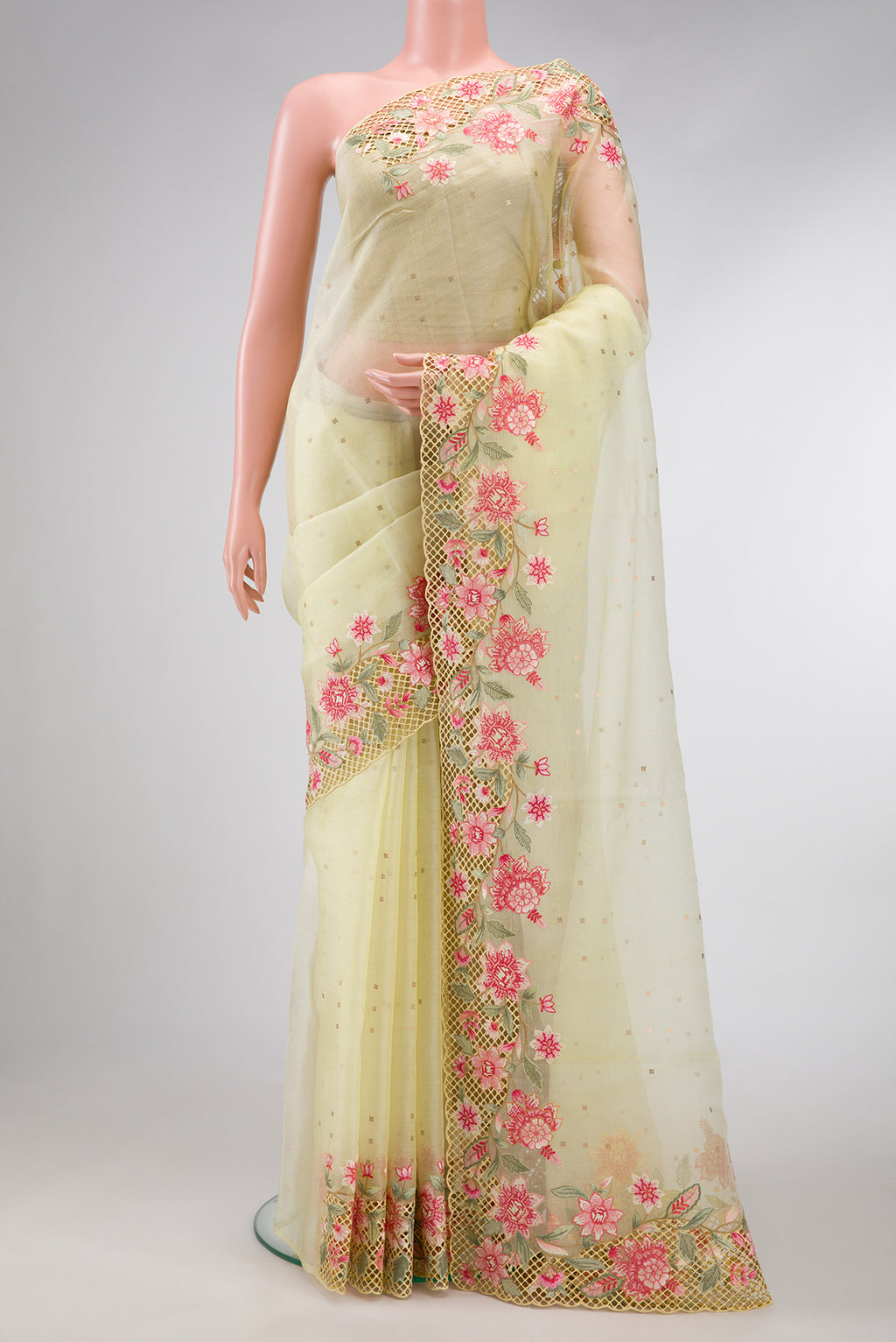 Lemon Yellow Dual Tone Organza Silk Saree with Embroidery on the body and Embroidery Border.  displayed on a mannequin