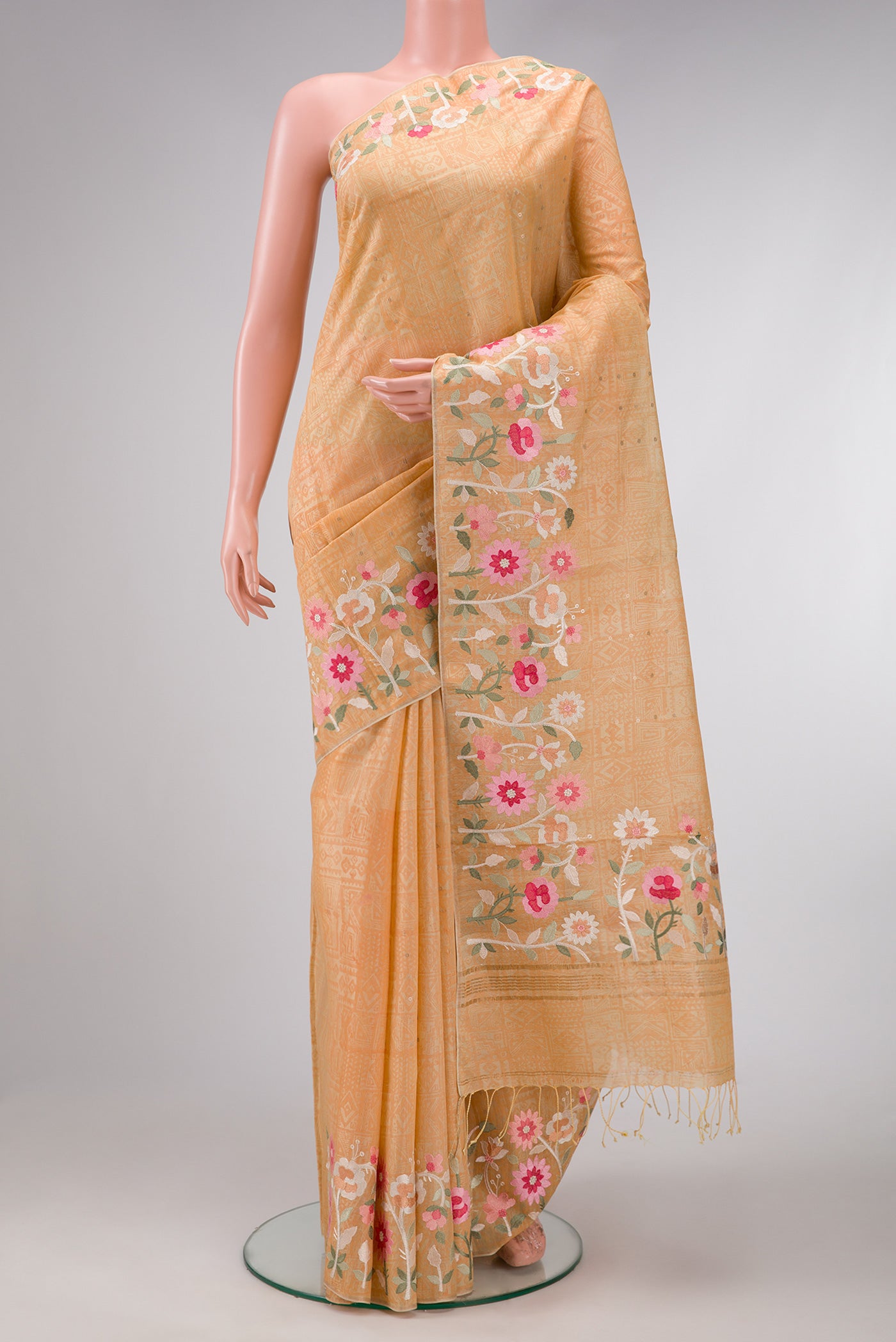 Beige Dual Tone Organza Silk Saree with Printed design on the body and Embroidery Border.  displayed on a mannequin