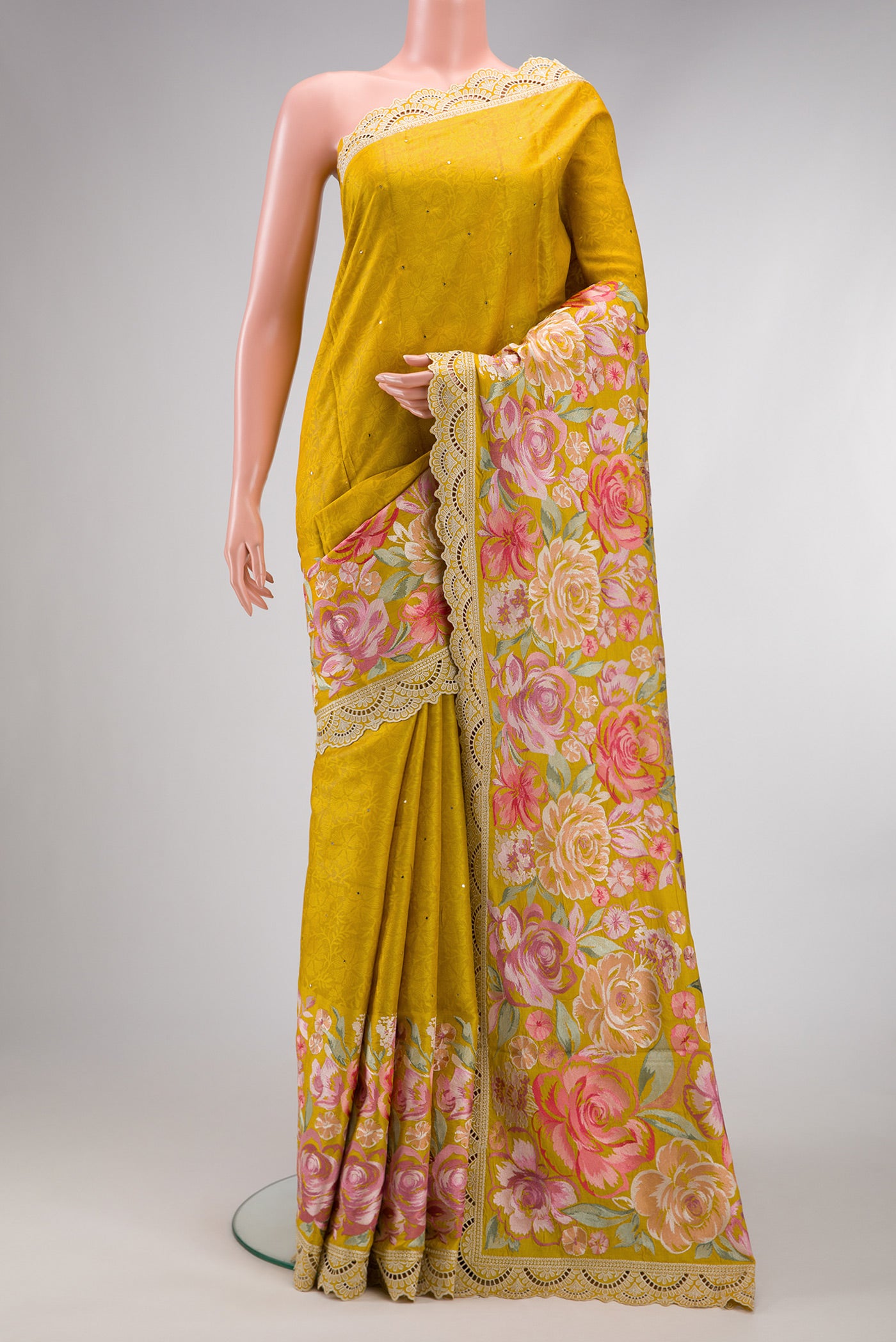 Mustard Dual Tone Tussar Silk Saree with Embroidery on the body and Embroidery Border.  displayed on a mannequin