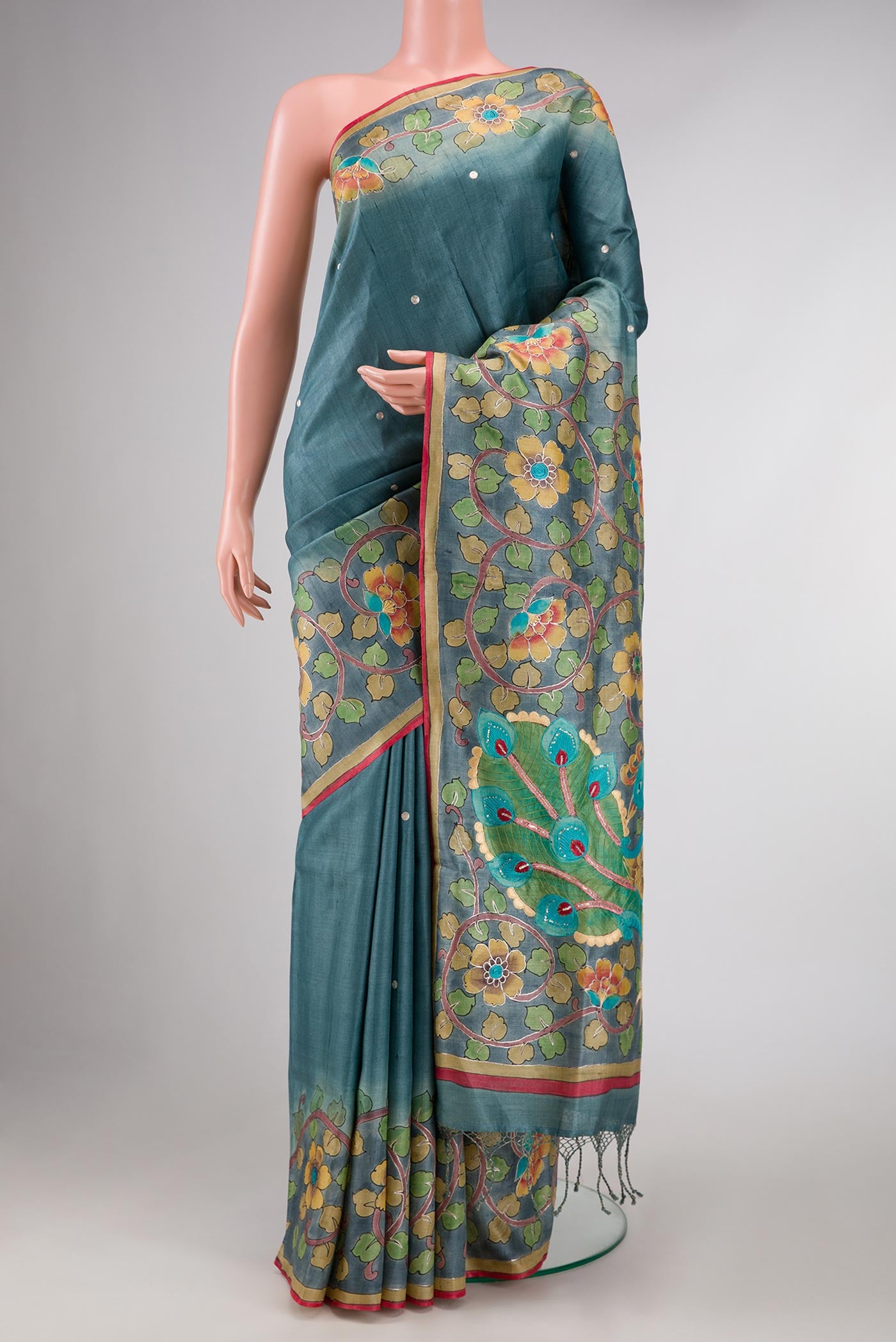 Blue Grey Dual Tone Tussar Silk Saree with Embroidery on the body and Embroidery Border displayed on a mannequin
