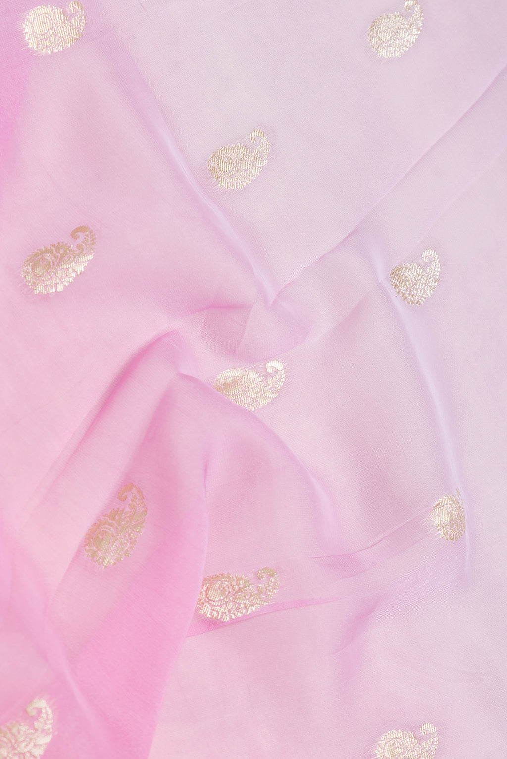 Close up of Pink and Lavender Color Blended Mysore Georgette Saree with Zari Butta on the body and Zari Border.  displaying folds