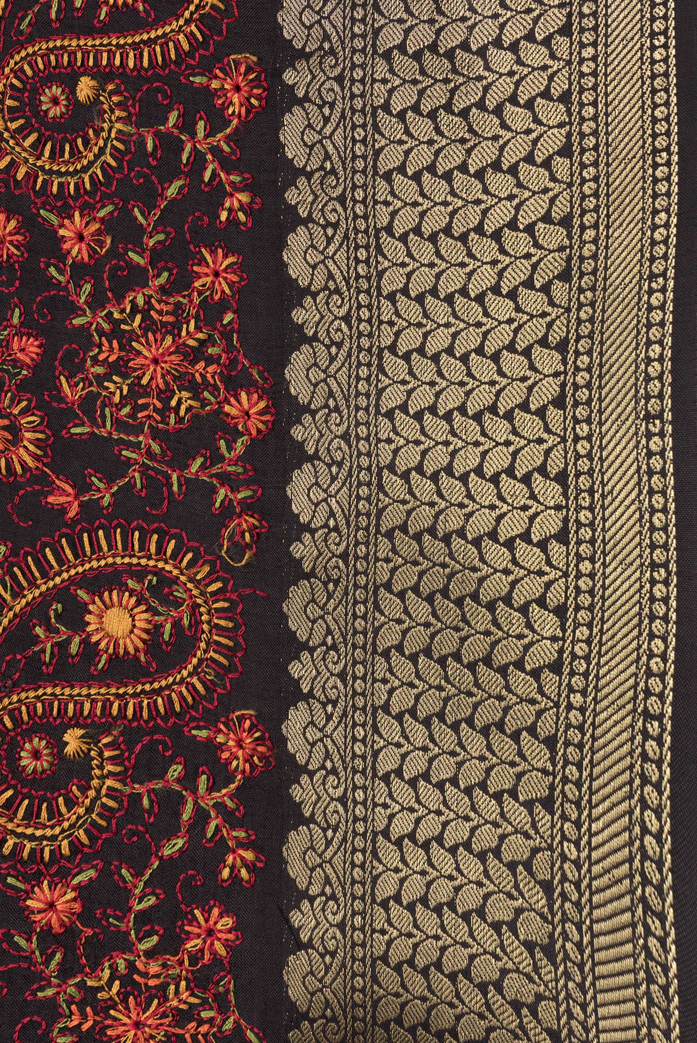Border image of Black Dual Tone Tussar Silk Saree with Embroidery on the body and Zari Border. 