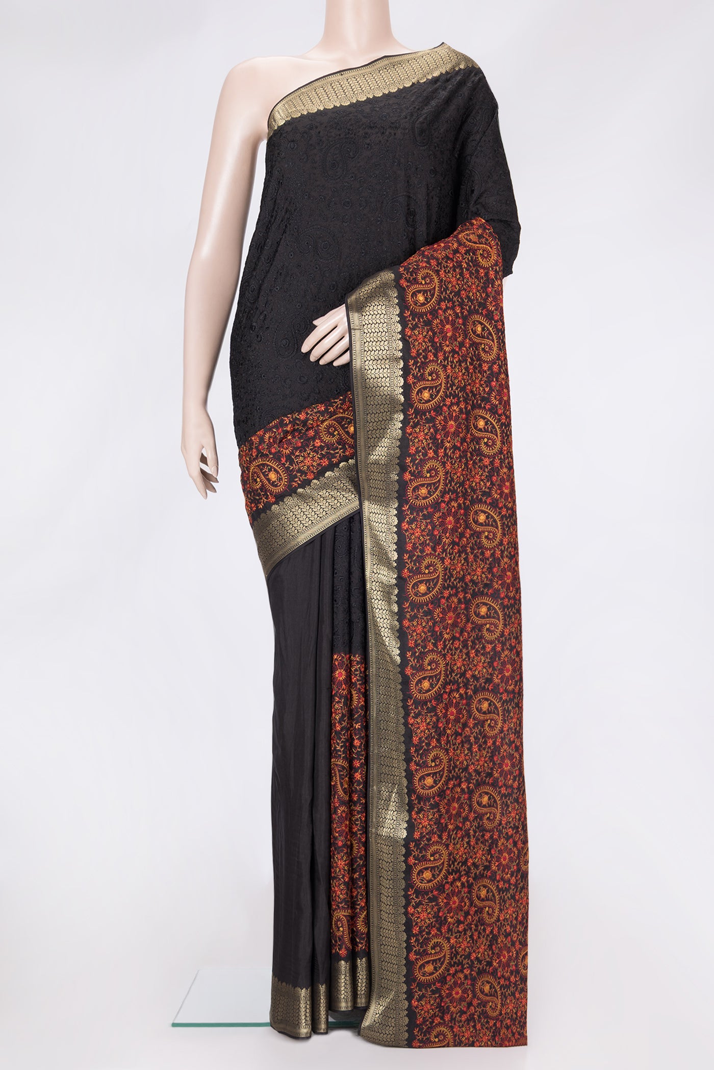 Black Dual Tone Tussar Silk Saree with Embroidery on the body and Zari Border.  displayed on a mannequin