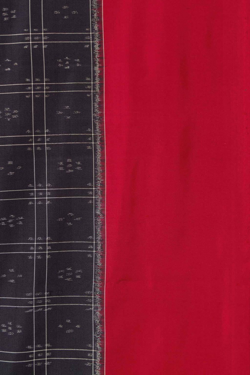 Border image of Black Dual Tone Double Ikat Saree with Ikat Print on the body and Plain Border