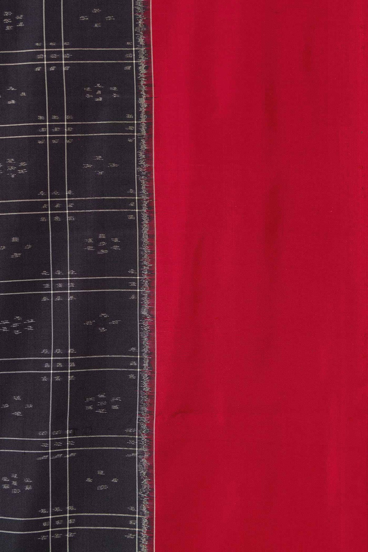 Border image of Black Dual Tone Double Ikat Saree with Ikat Print on the body and Plain Border