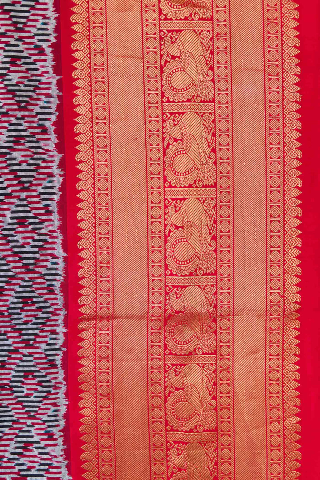 Border image of Burgundy Dual Tone Double Ikat Saree with Ikat Print on the body and Zari Border