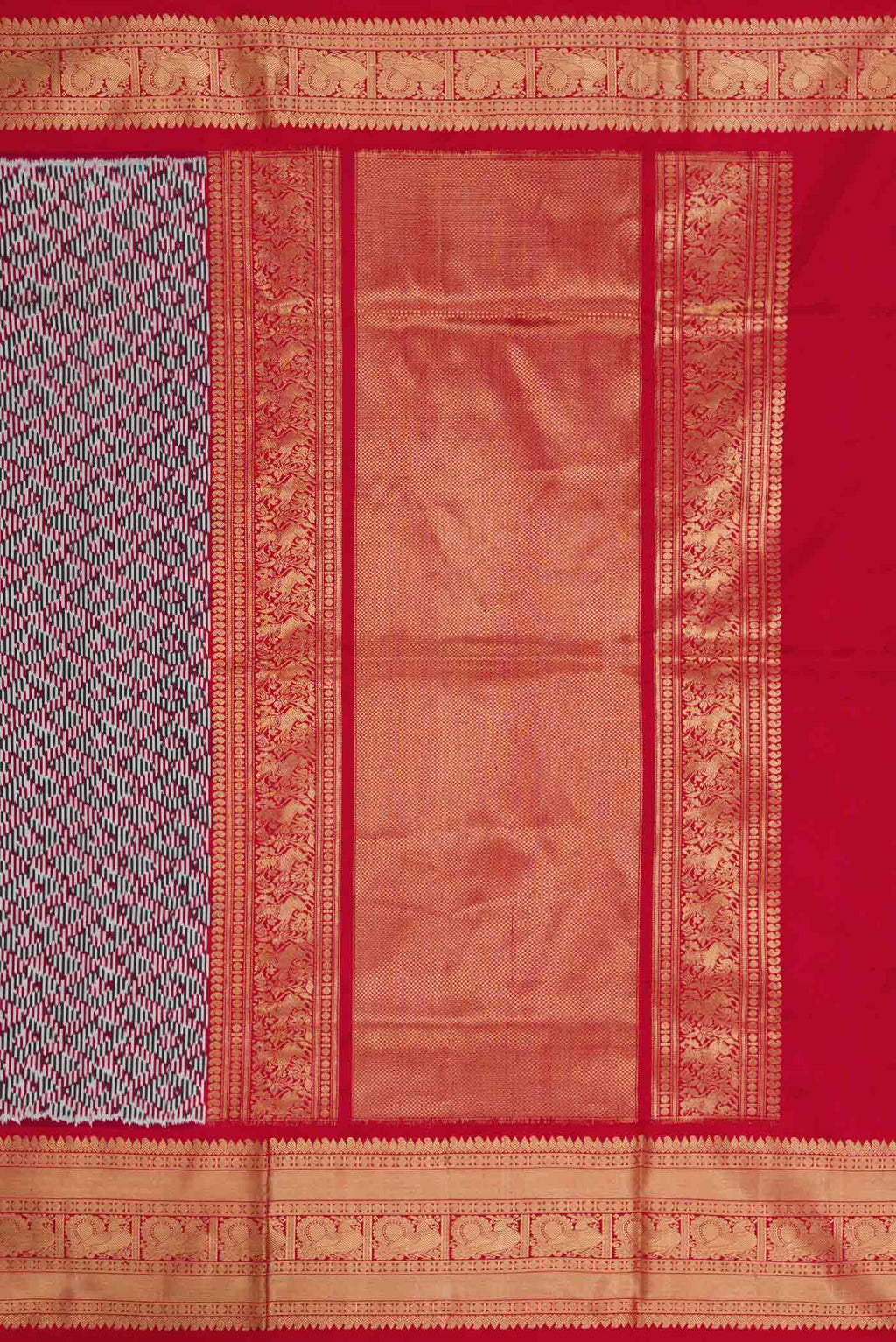 Close up image of the pallu of Burgundy Dual Tone Double Ikat Saree with Ikat Print on the body and Zari Border