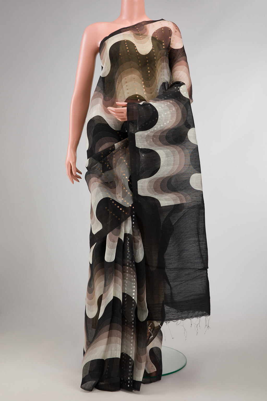 Black Dual Tone Tussar Silk Saree with Embroidery on the body and Without Border displayed on a mannequin