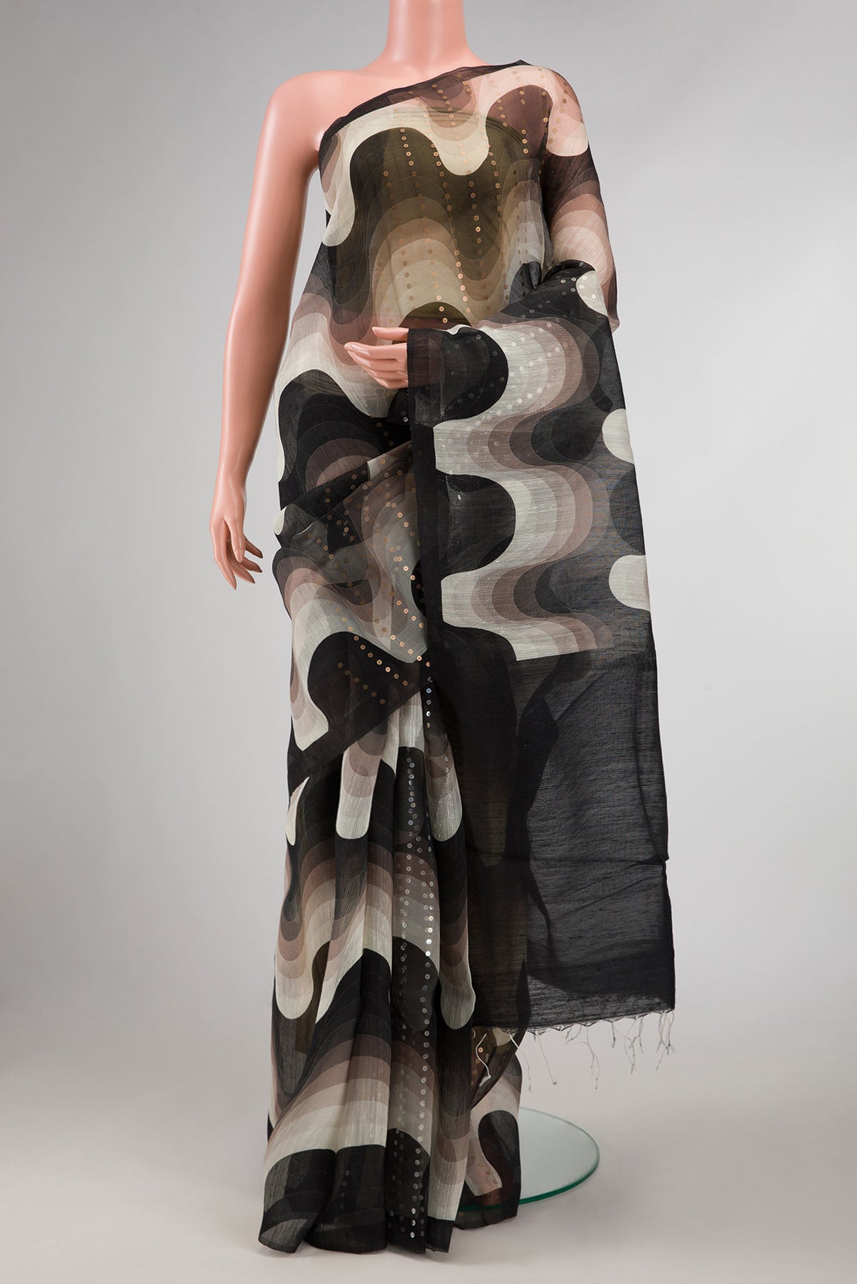 Black Dual Tone Tussar Silk Saree with Embroidery on the body and Without Border displayed on a mannequin