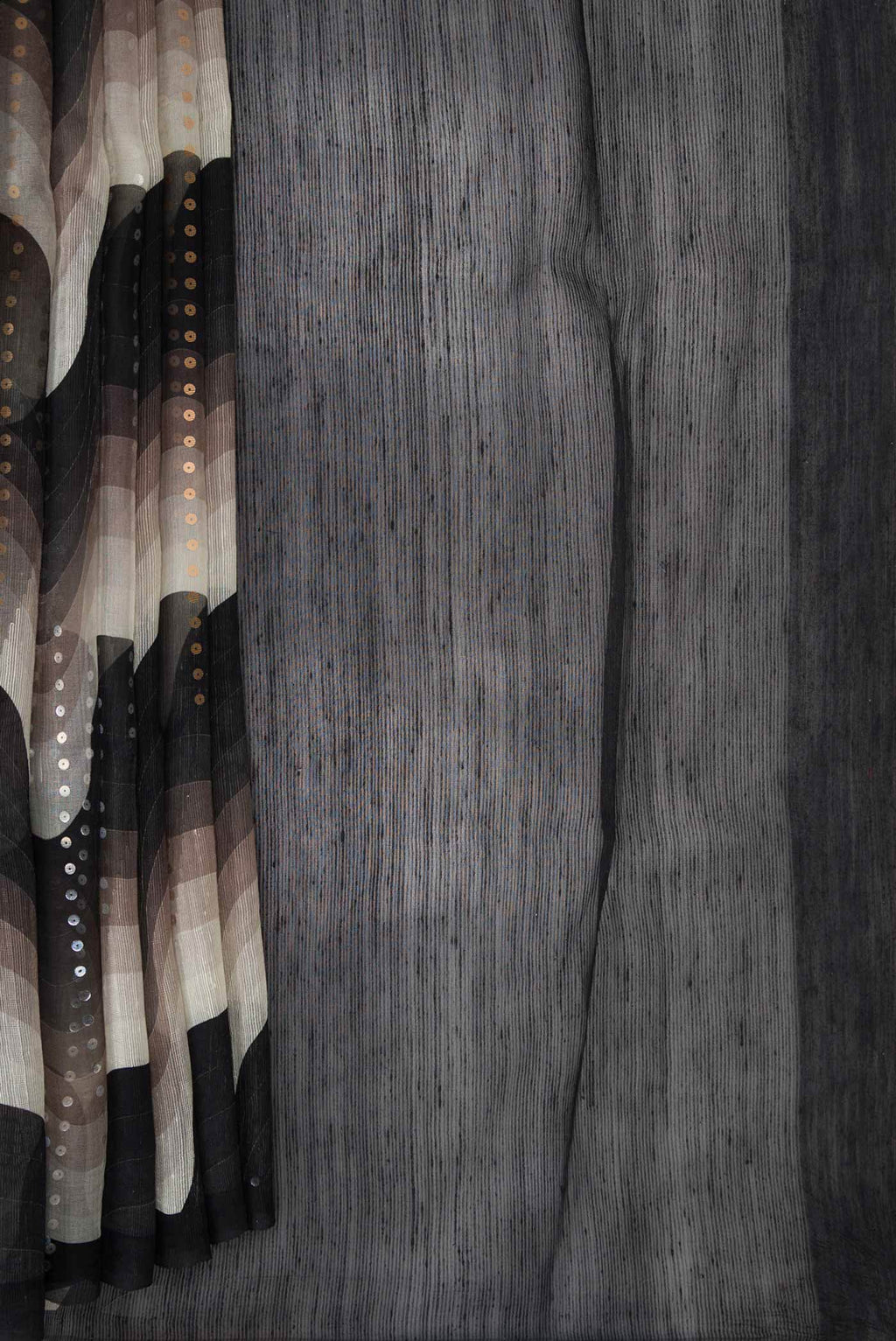 Pleats and pallu of Black Dual Tone Tussar Silk Saree with Embroidery on the body and Without Border