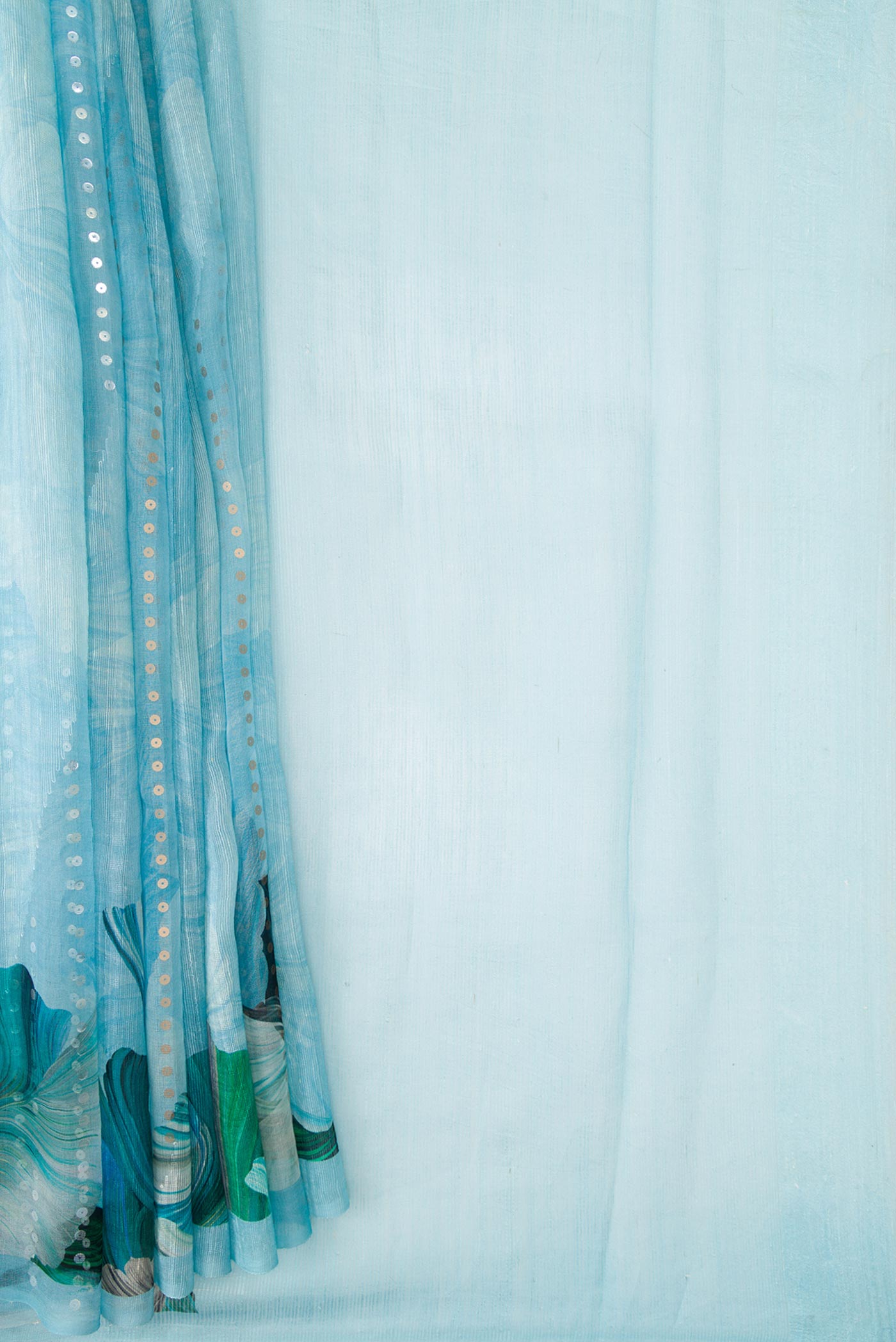 Pleats and pallu of Light Blue Dual Tone Tussar Silk Saree with Embroidery on the body and Without Border