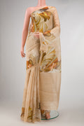 Beige Dual Tone Tussar Silk Saree with Embroidery on the body and Without Border displayed on a mannequin