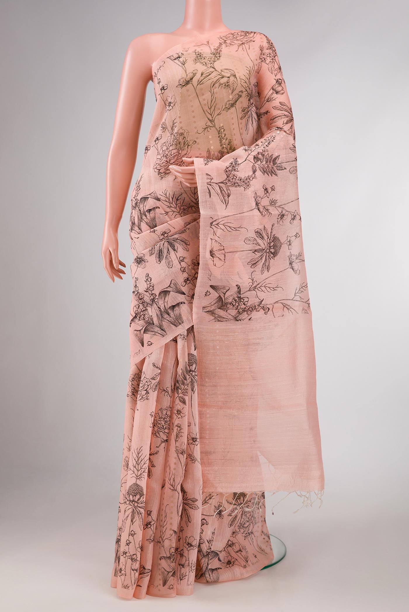 Rose pink Dual Tone Tussar Silk Saree with Embroidery on the body and Without Border displayed on a mannequin