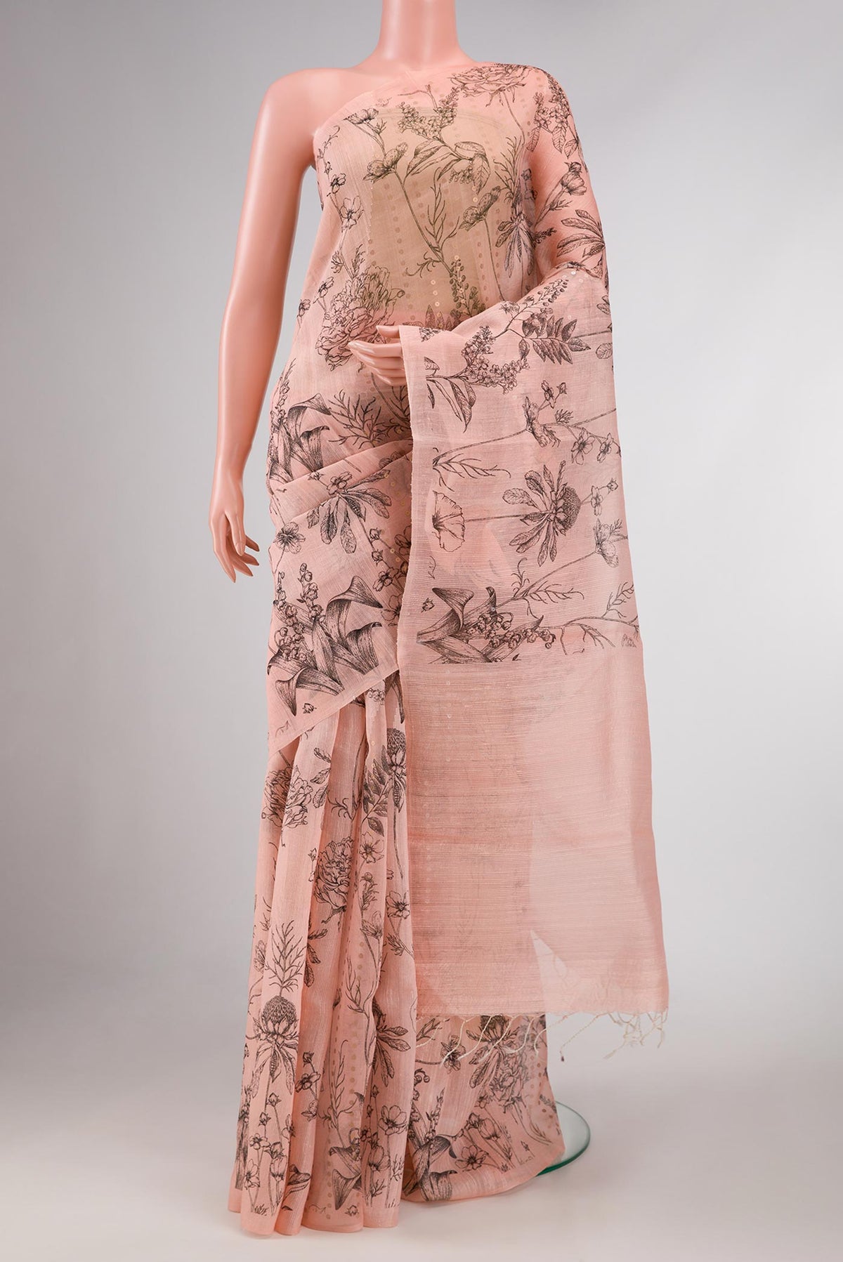 Rose pink Dual Tone Tussar Silk Saree with Embroidery on the body and Without Border displayed on a mannequin