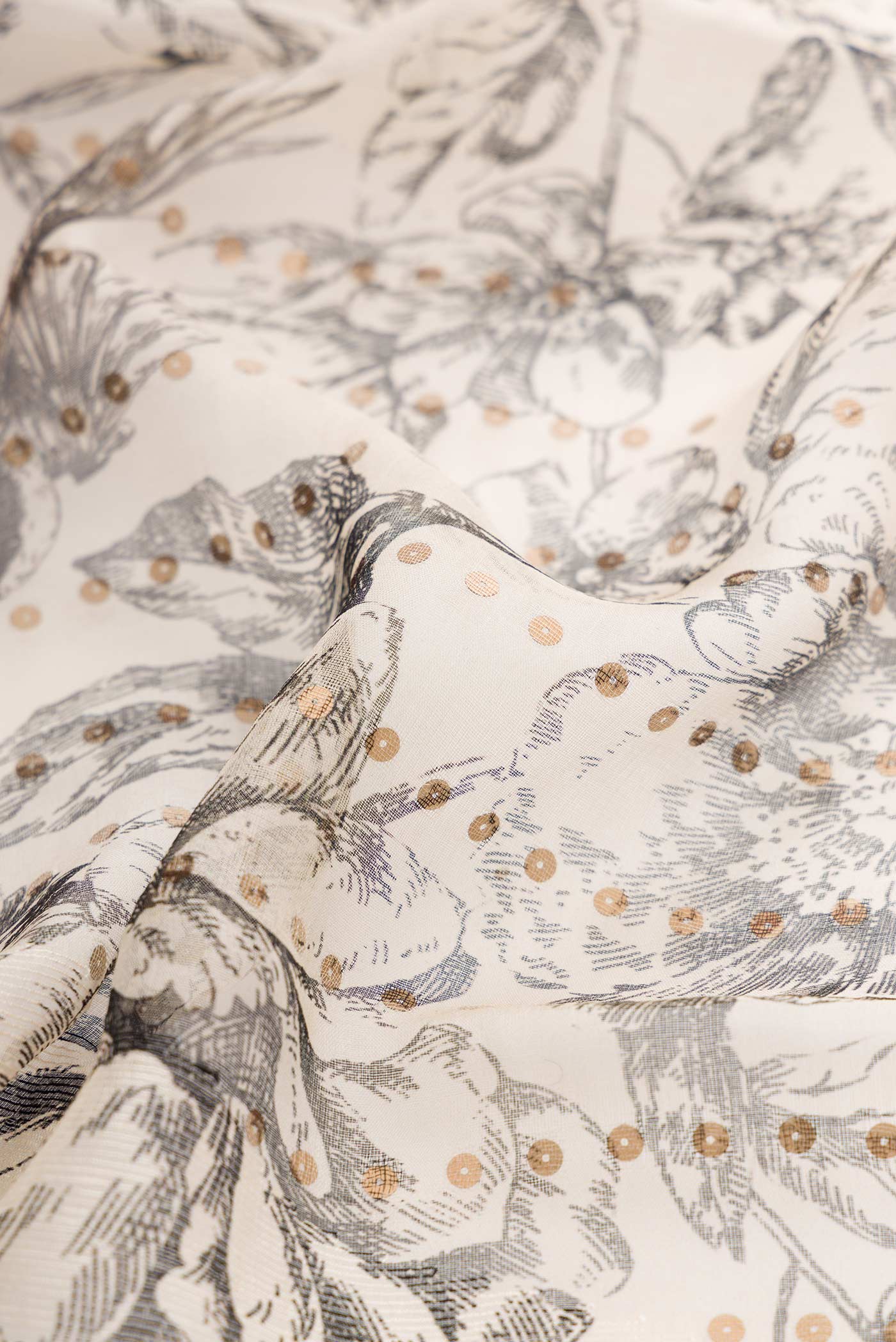 Close up of Sandal Dual Tone Tussar Silk Saree with Embroidery on the body and Without Border displaying folds