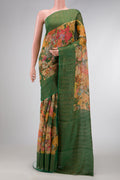 Green Dual Tone Tussar Silk Saree with Printed design on the body and Embroidery Border.  displayed on a mannequin