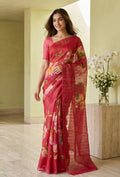 Model wearing a Red Tussar Silk Saree with Floral Print on the body and Embroidery Border.