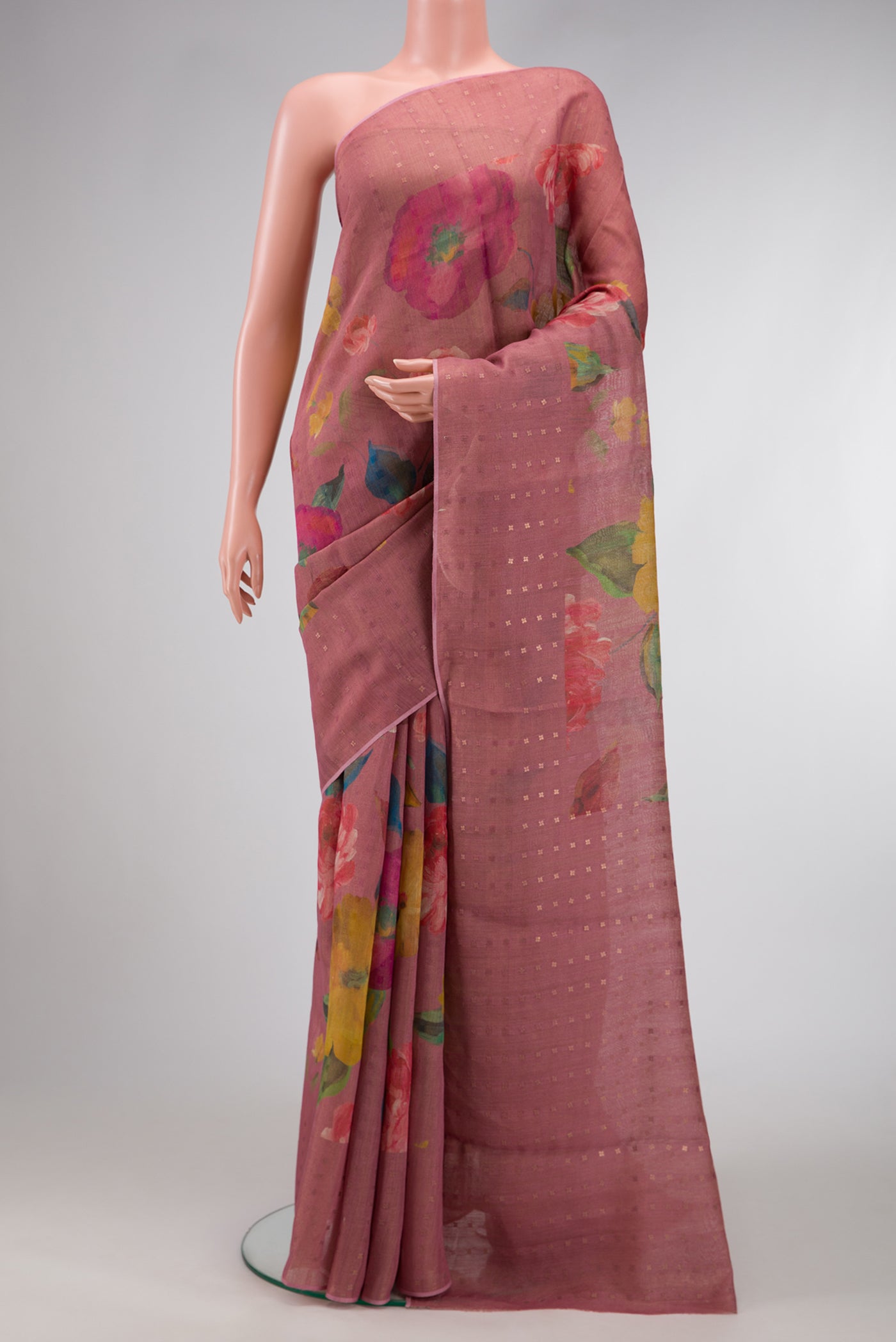Rose pink Dual Tone Tussar Silk Saree with Printed design on the body and Embroidery Border.  displayed on a mannequin