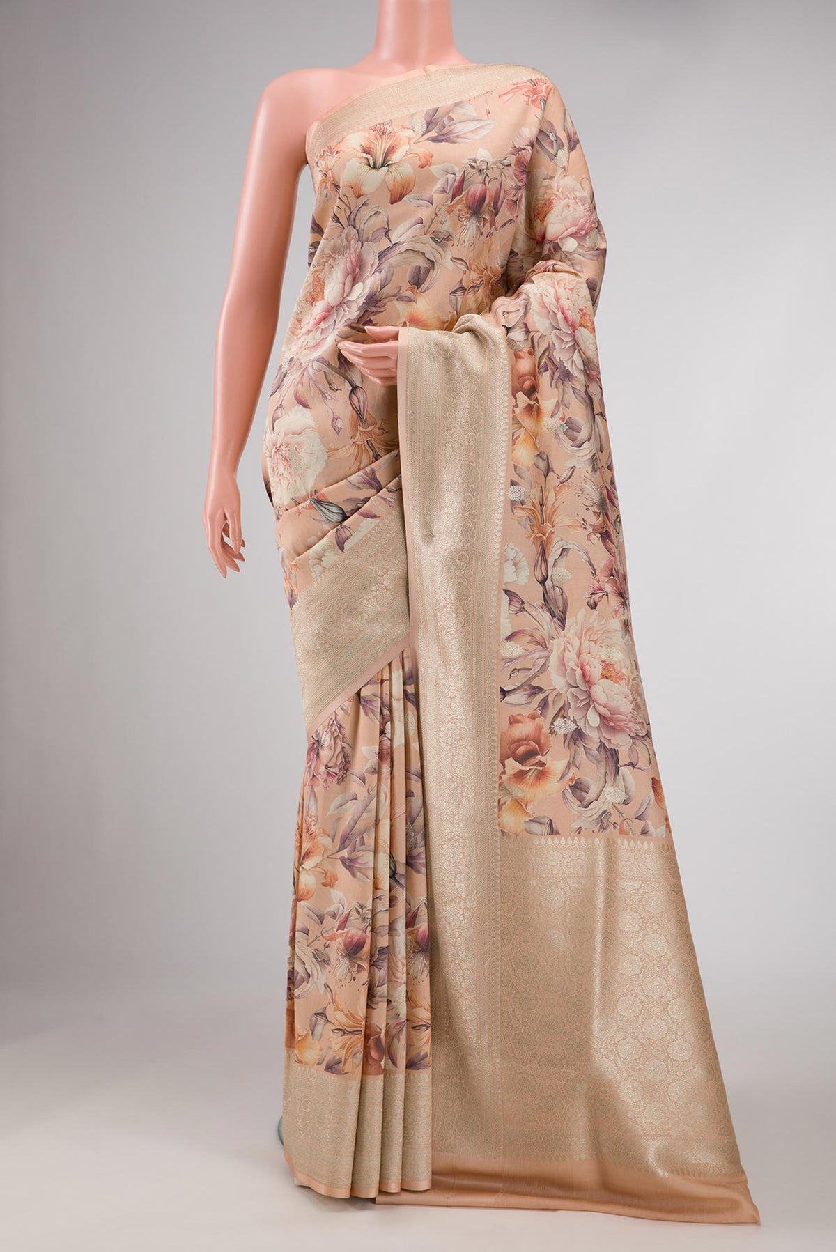 Peach Dual Tone Tussar Silk Saree with Printed design on the body and Zari Border displayed on a mannequin