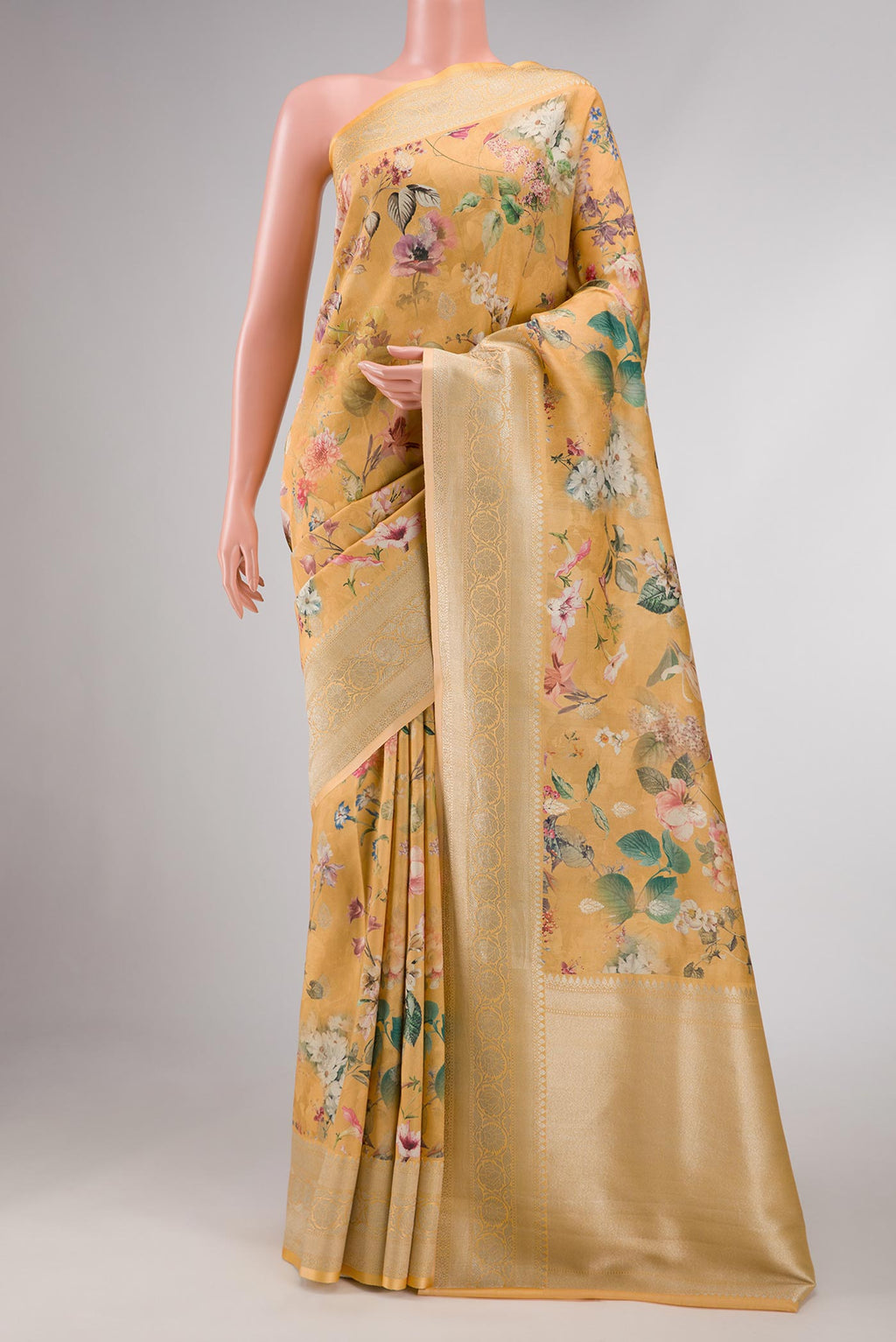 Sandal Dual Tone Tussar Silk Saree with Printed design on the body and Zari Border displayed on a mannequin